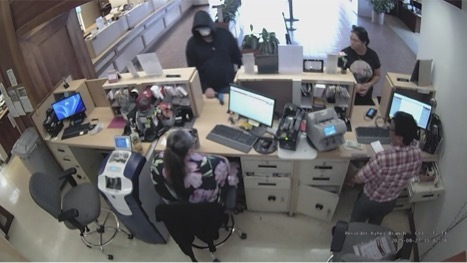 A bank security image of Justin Nelson robbing a Kīhei bank last August.