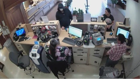 A bank security image of Justin Nelson robbing a Kīhei bank last August.