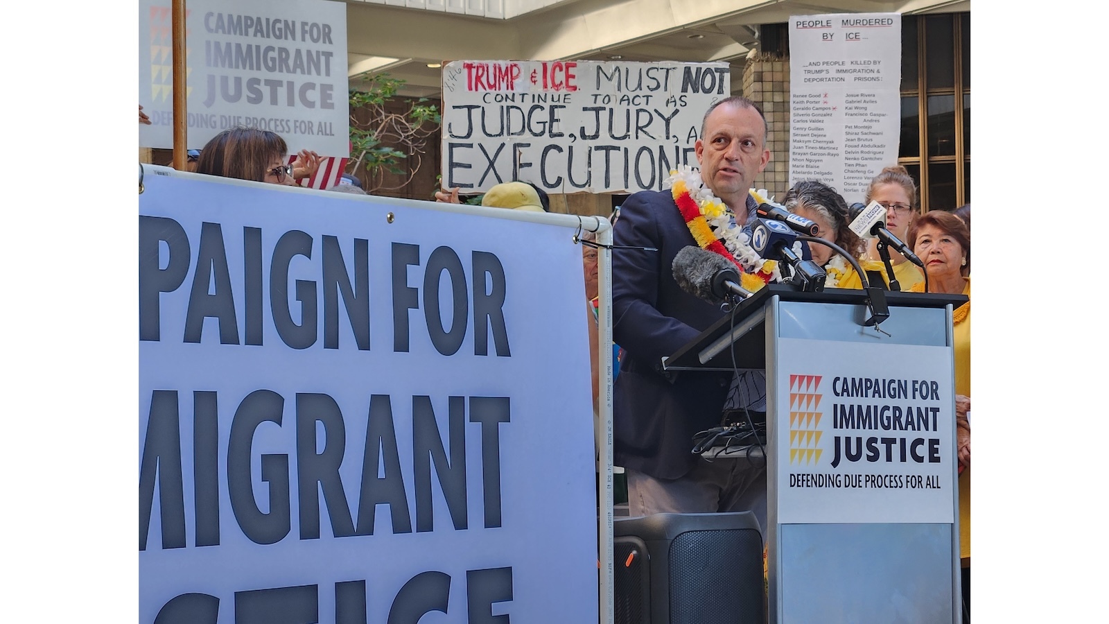 Gov. Josh Green speaks at a vigil Tuesday.