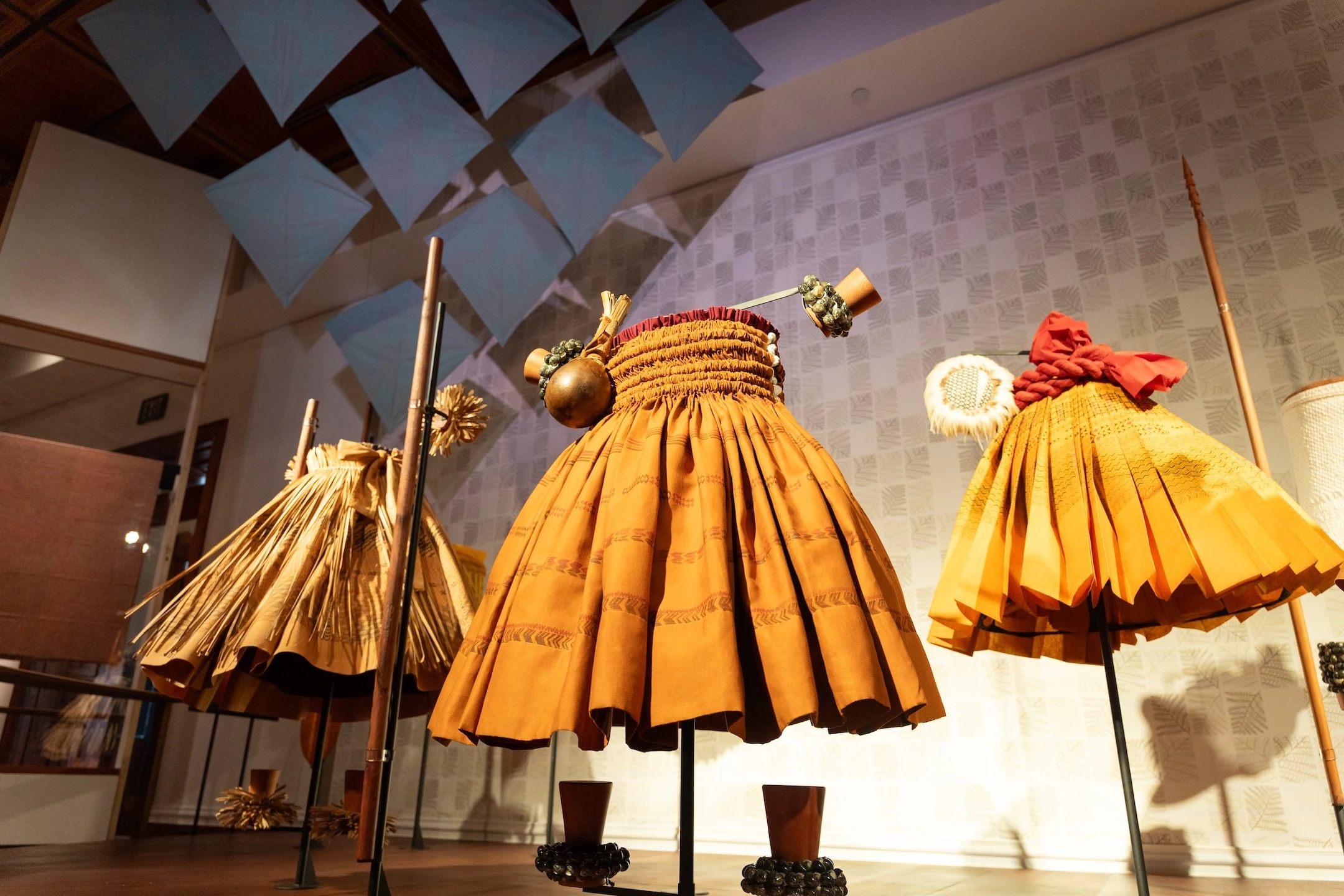 The exhibit includes archival hula ʻaʻahu, or hula garments, designed by Nālani Kanakaʻole and made by students of Hālau o Kekuhi.