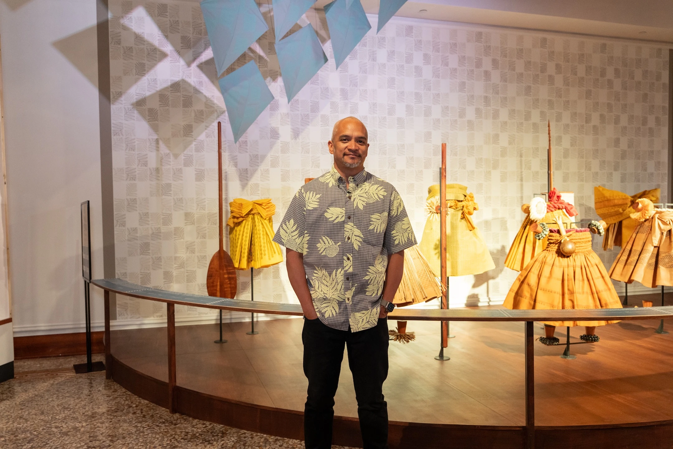 The exhibit features the graphic design and immersive installations of Kūhaʻoʻīmaikalani Zane.