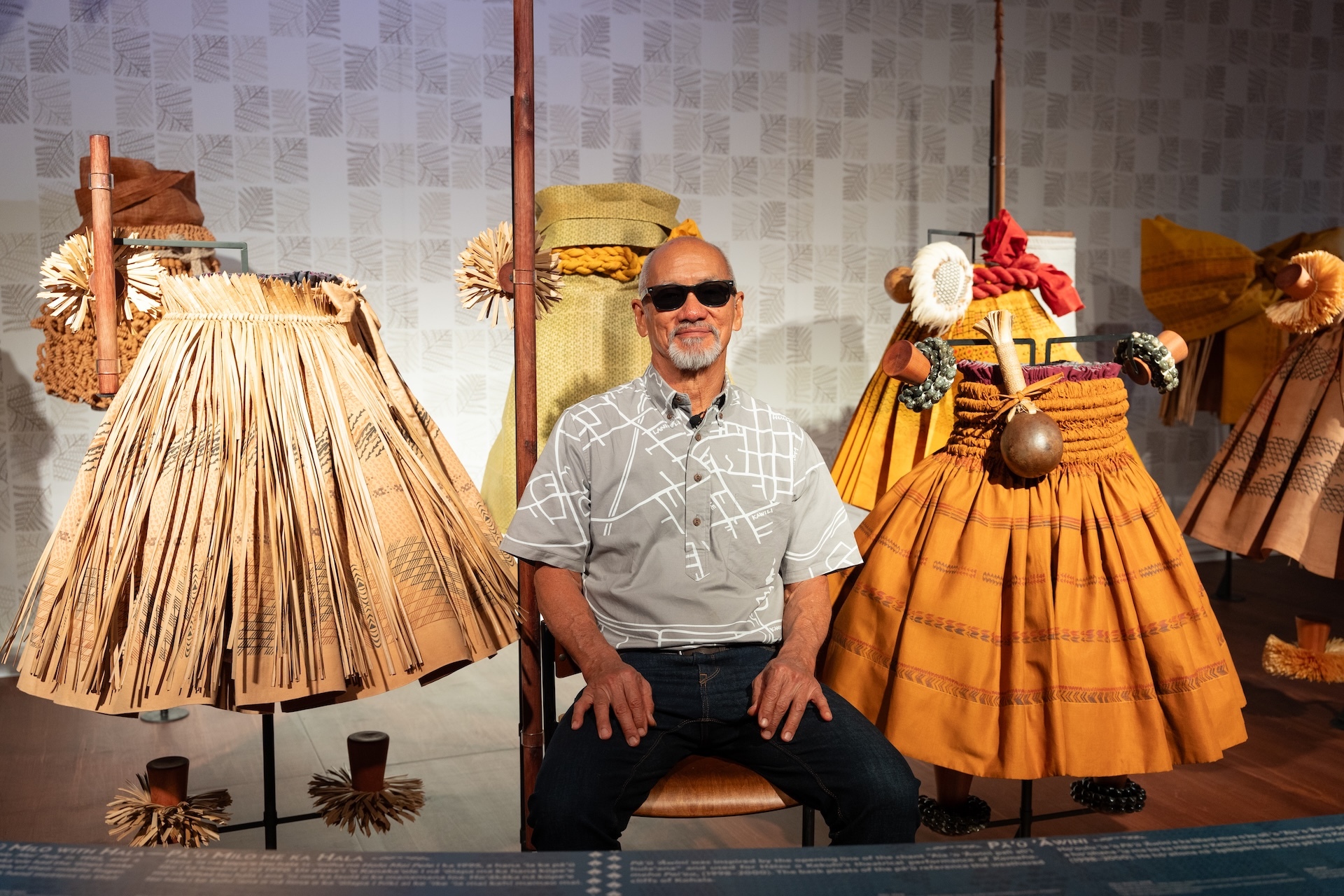 Sig Zane at the newly installed "Ea Mai ʻEiwa: Patterns of Practice" exhibit at Bishop Museum.