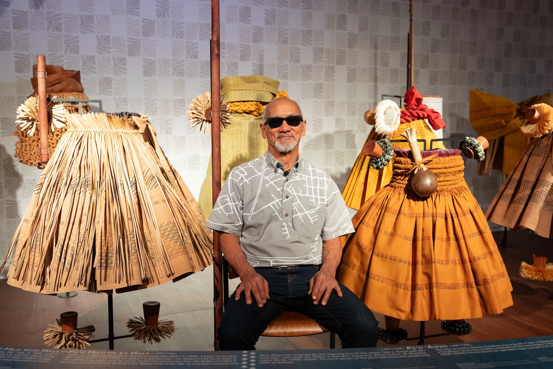 Sig Zane at the newly installed "Ea Mai ʻEiwa: Patterns of Practice" exhibit at Bishop Museum.