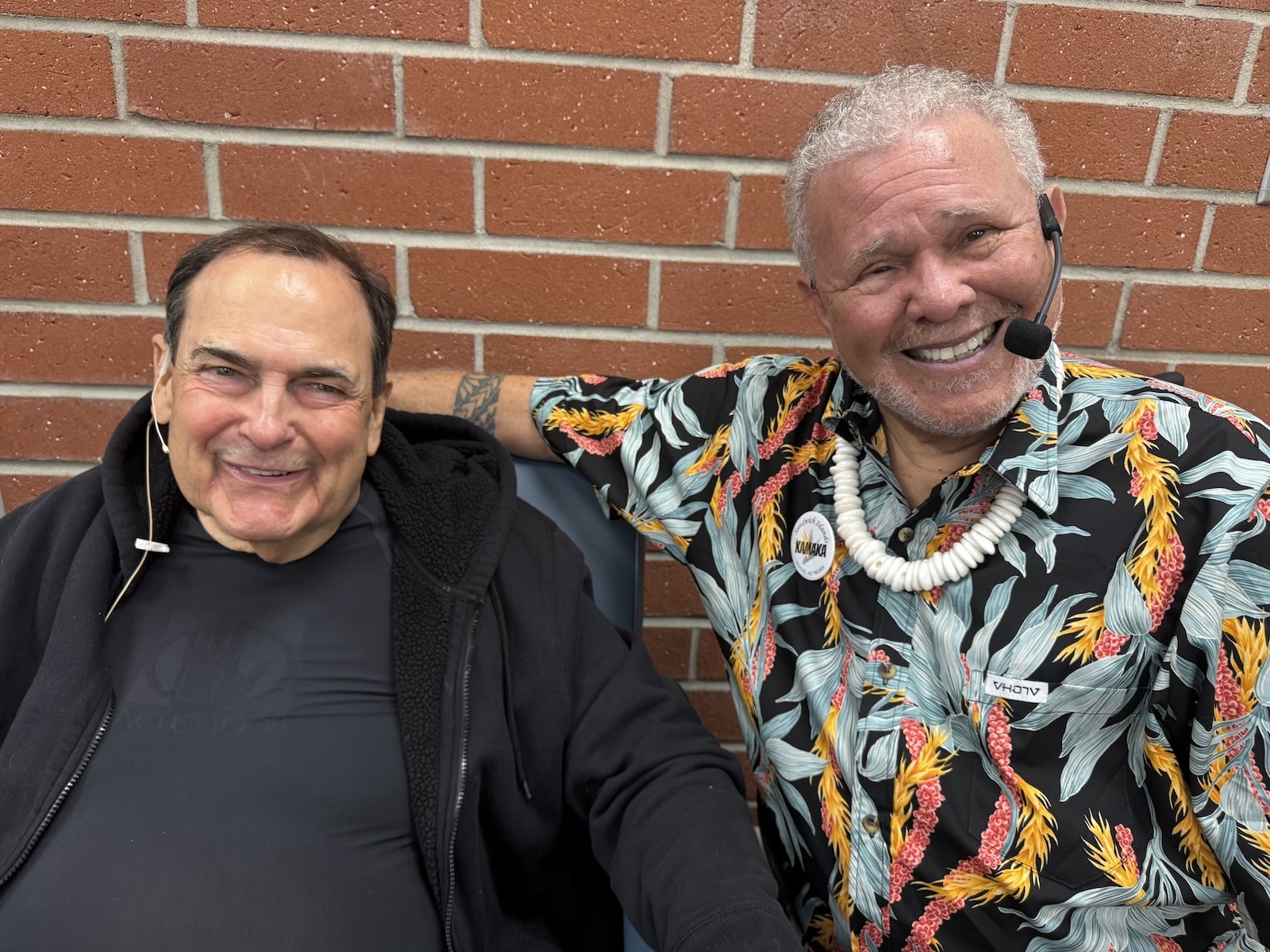Promoter/podcaster Kamaka Brown, right, opened for De Lima, left, in what he called the "Jurassic Unkoz," or Uncles, which, of course, included a dinosaur costume.