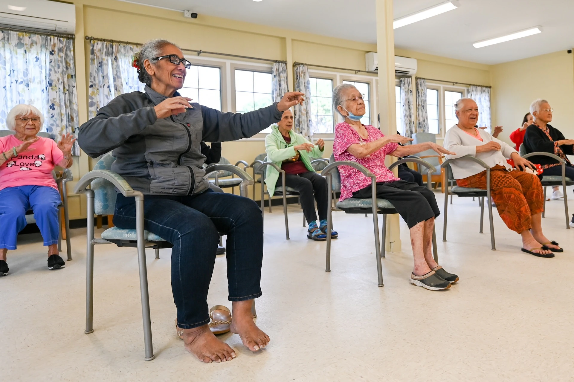 Kupuna dancing hula.
