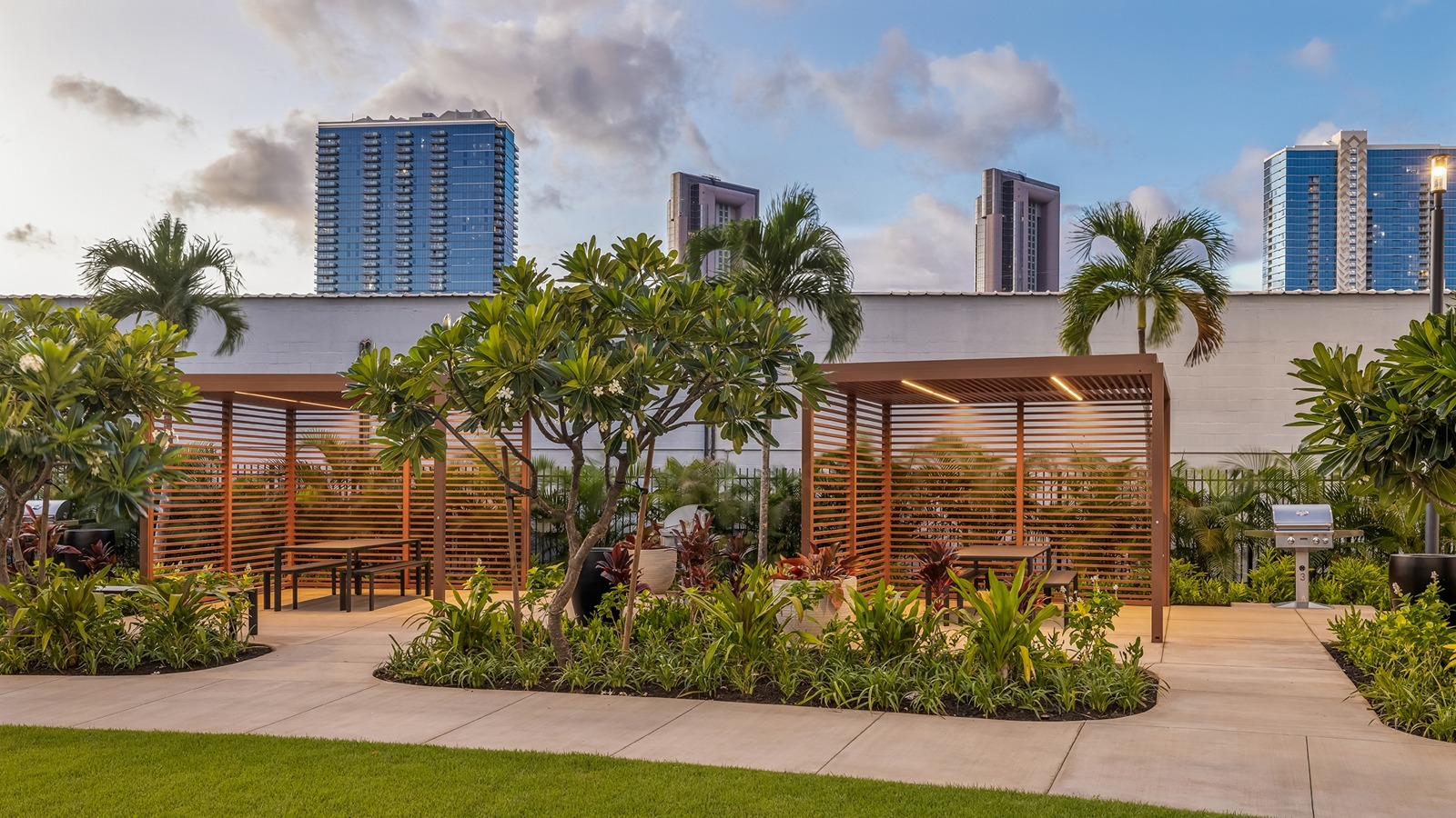 Ulana Ward Village lawn and barbeque cabanas.