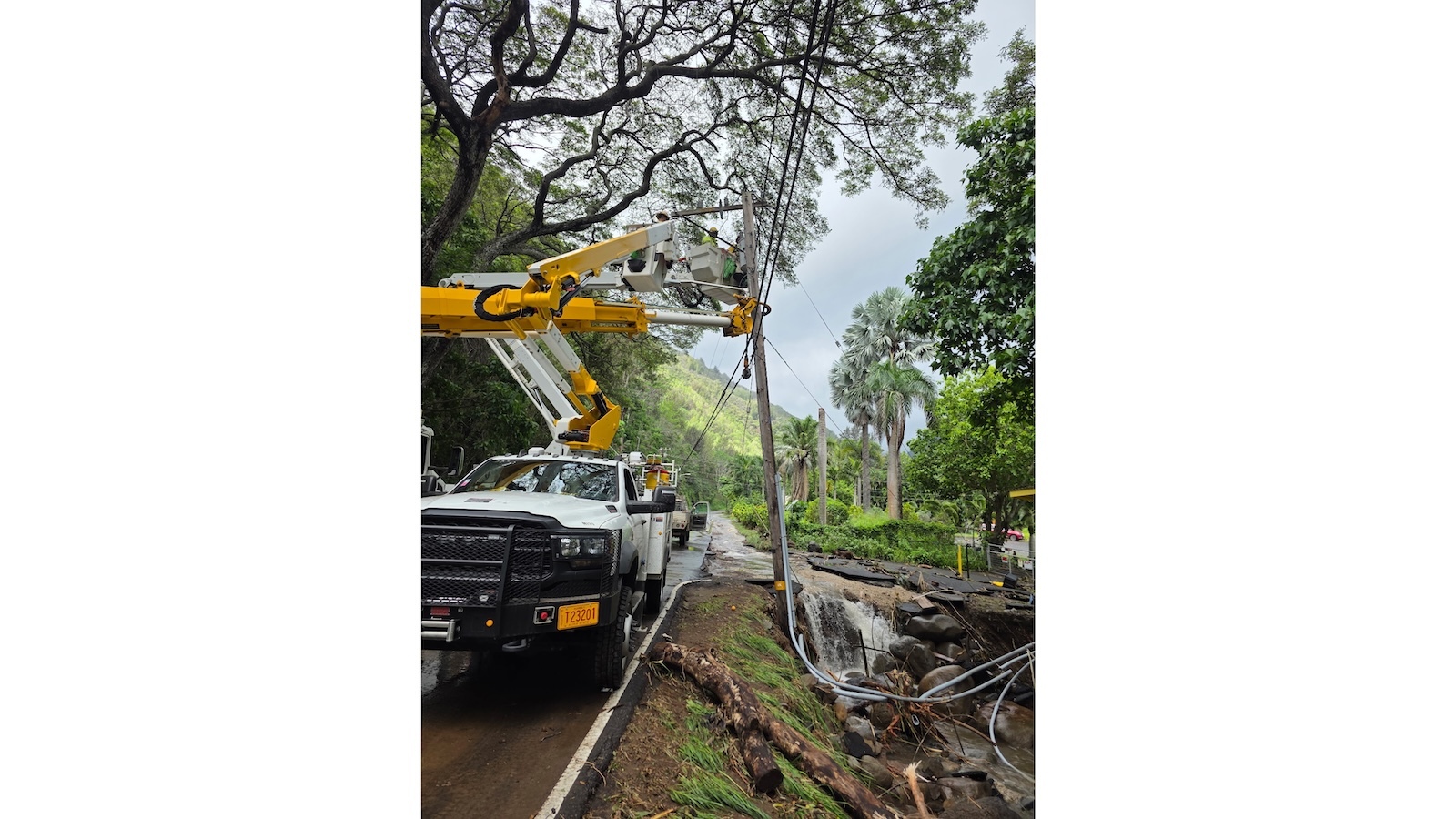 Hawaiian Electric crews at work repairing storm damage in ‘Īao Valley on March 18.