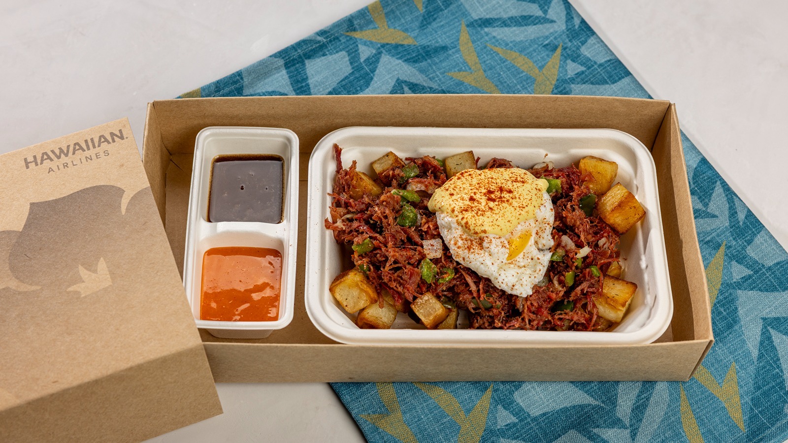 Corned beef hash, poached egg and roasted breakfast potatoes.