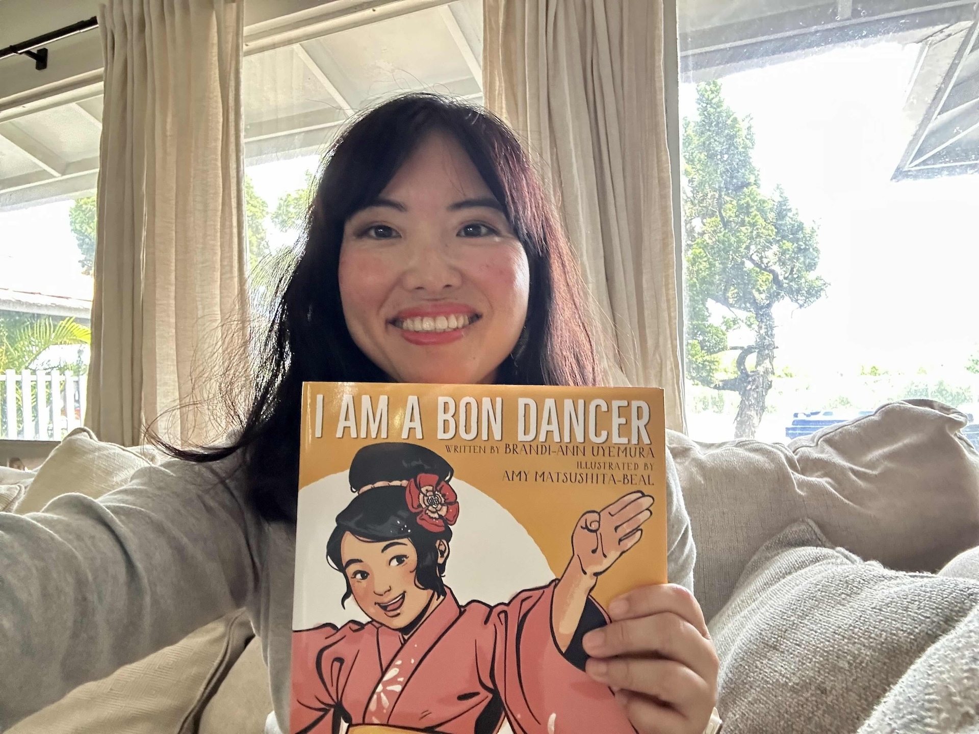 Born and raised in Hawaiʻi, Brandi-Ann Uyemura has worked as an essayist, research assistant, coach, therapist, and now a children’s book author, with her debut of "I am a Bon Dancer."