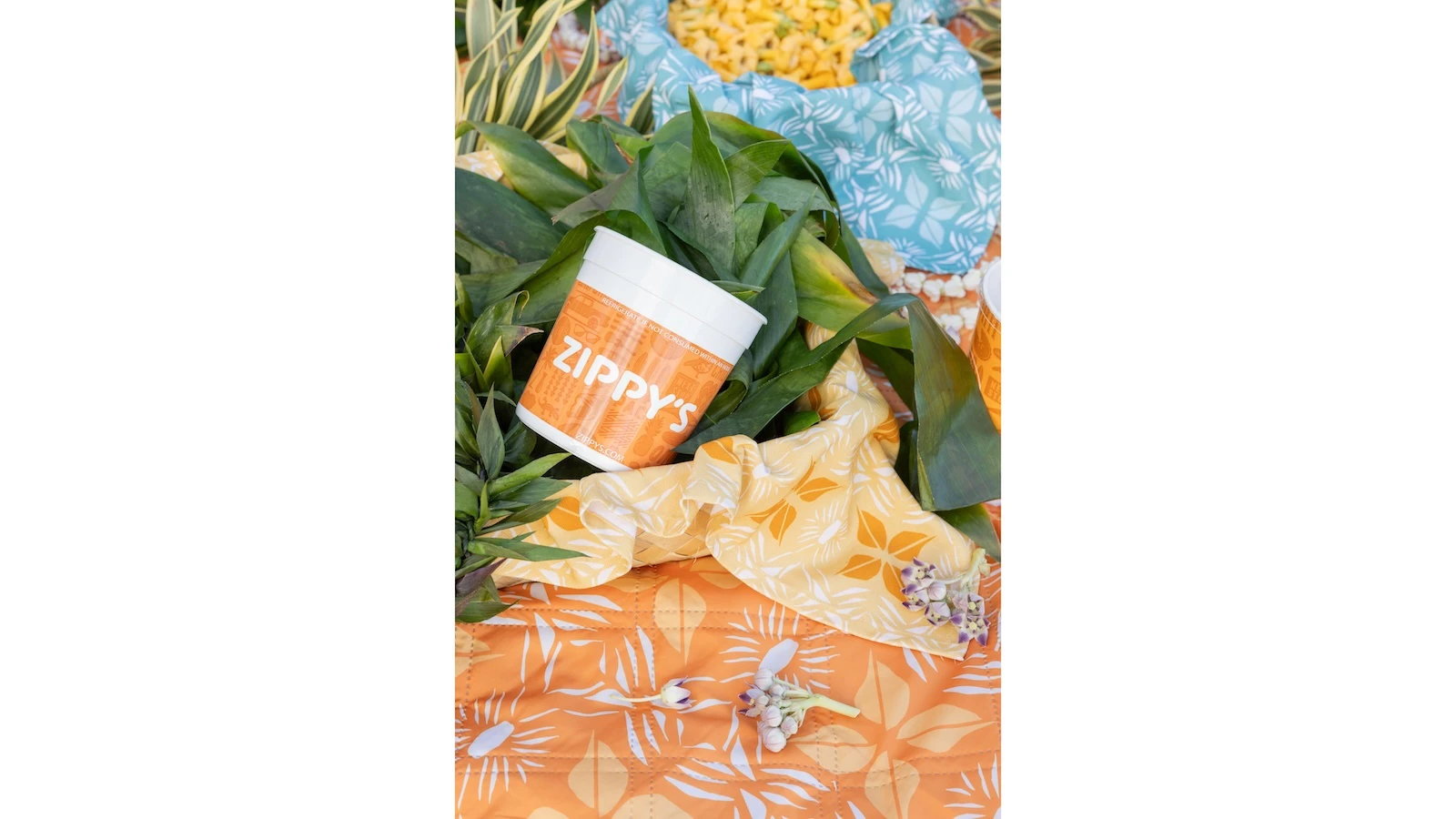 Zippy's and NOHO HOME Hawai‘i have collaborated on a capsule collection of four items that will be released next week. The collection includes a set of two tea towels in two different colorways, chopsticks and a foldable picnic blanket.