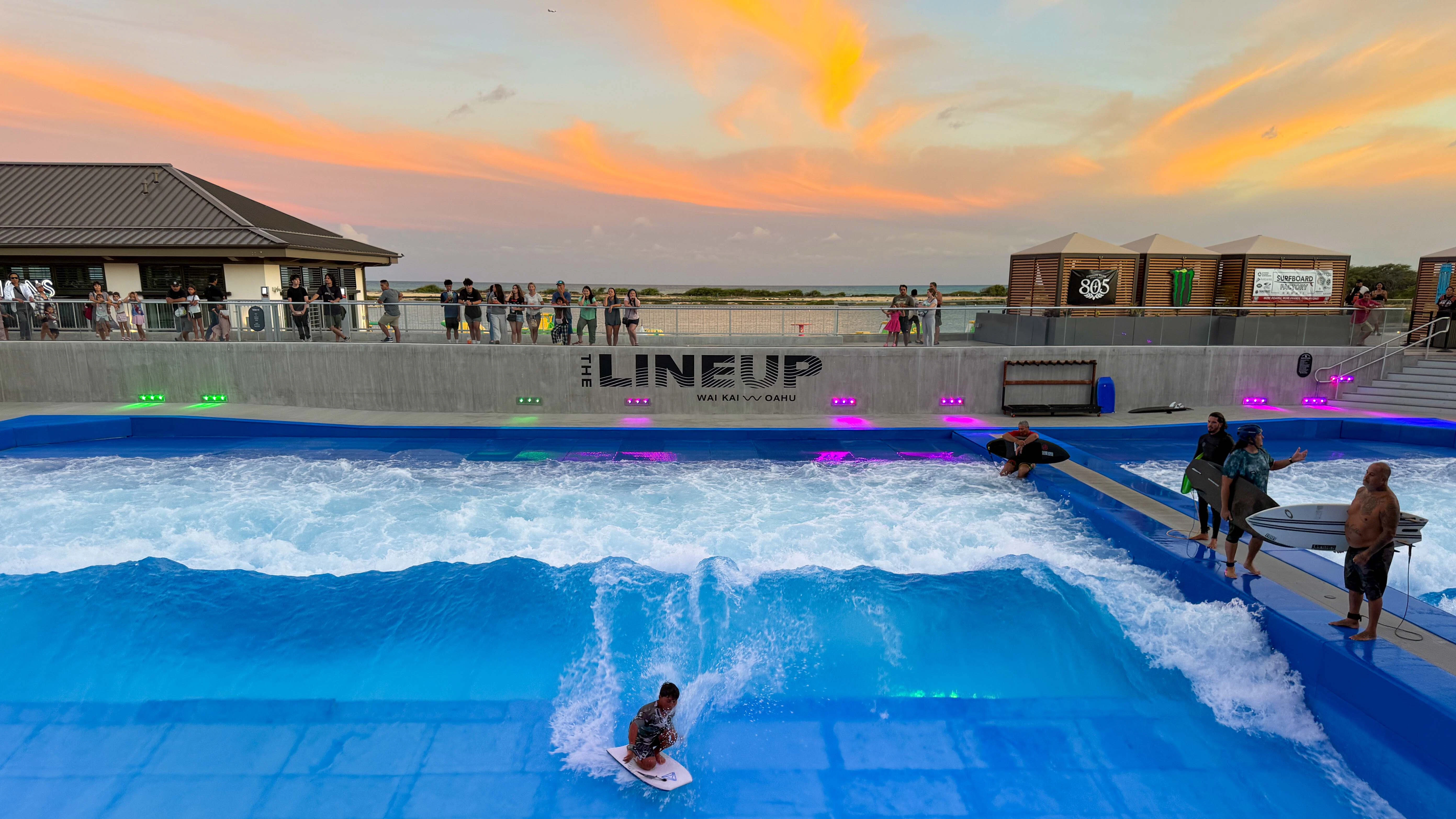 Bodyboarder and sunset