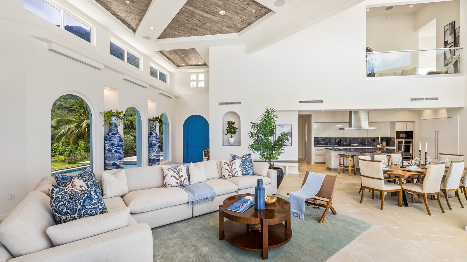An interior shot of the living room and open-concept kitchen.