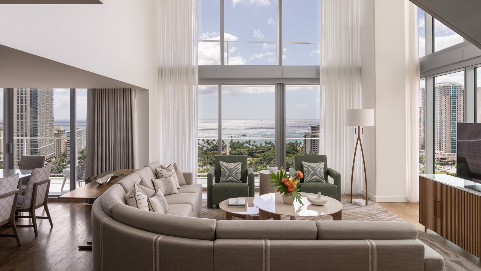 The living room of a four-bedroom suite, part of The Ritz-Carlton Residences, Waikiki Beach's newly debuted Ritz-Carlton Suite Collection.