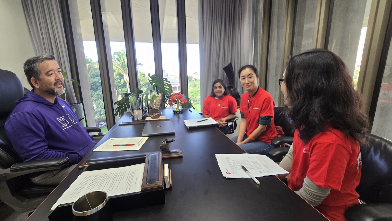 AIA Hawai‘i State Council members Krithika Penedo, Julie Lam and Marni Tam meet with state Rep. Andrew Takuya Garrett at the state Capitol on Jan. 29.
