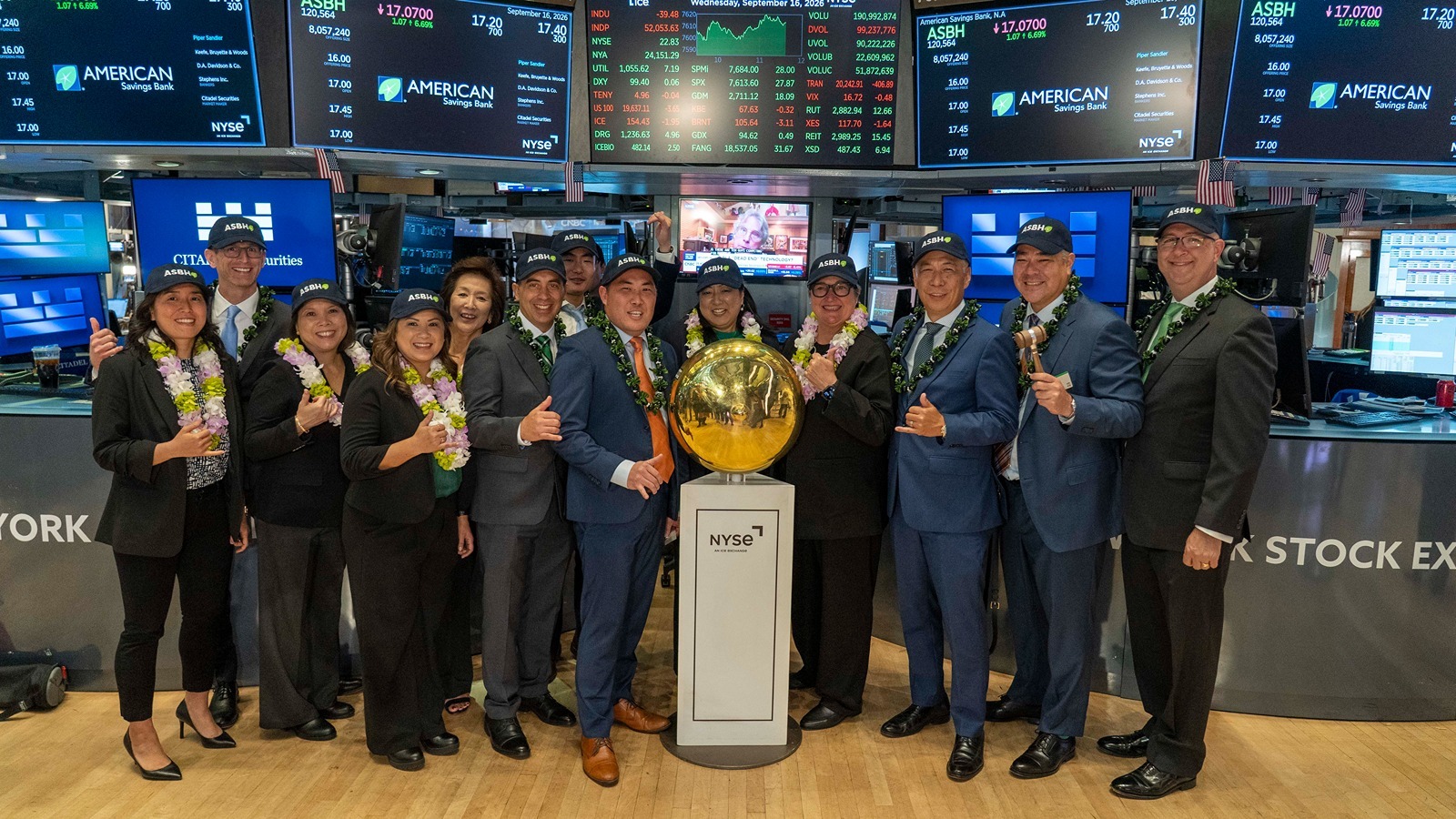 American Savings Bank employees rang the first trade bell Wednesday at the New York Stock Exchange.