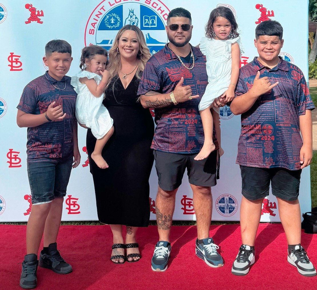 Family photo at a Saint Louis School event.