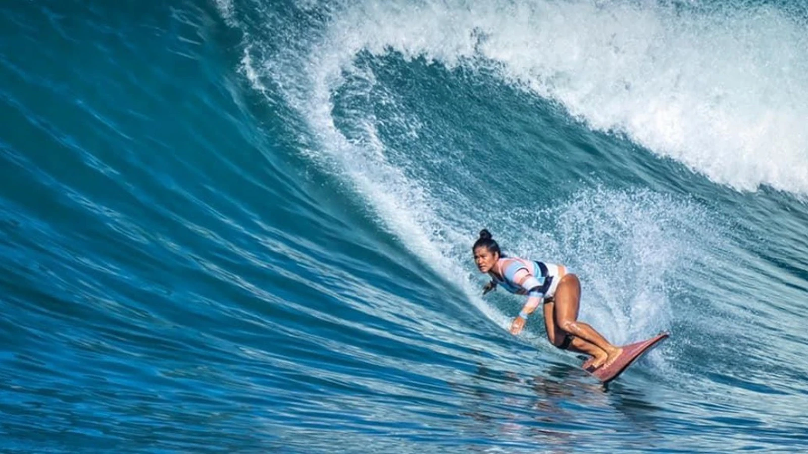 Romer House Waikīkī will launch Après Surf, a new community surf club hosted by pro surfers Meg Godinez, known as Aunty Megz, pictured, and Makoa Kaleiki Ho, on July 18.