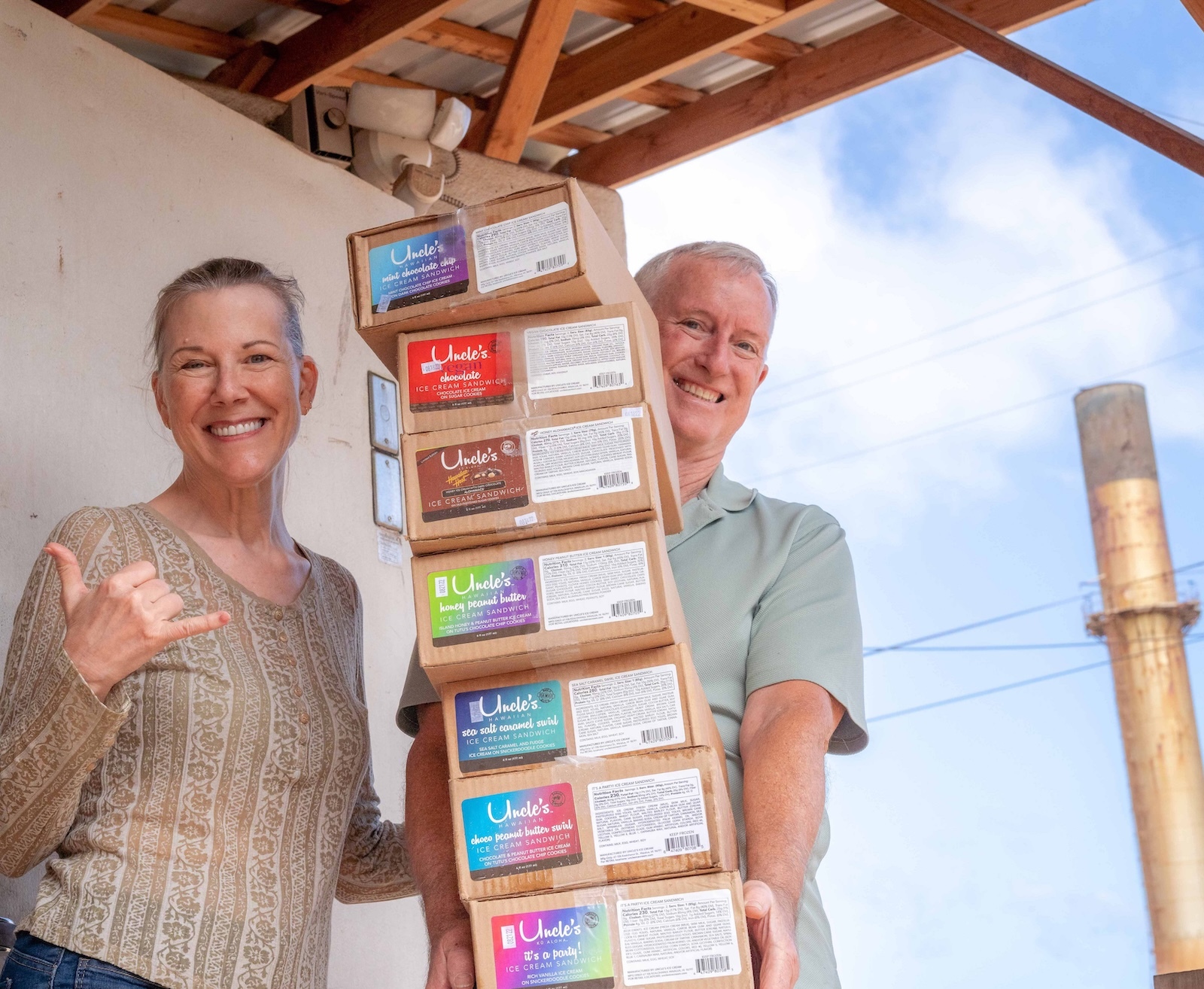 The Logans are ready to deliver boxes of ice cream sandwiches to Oahu stores.