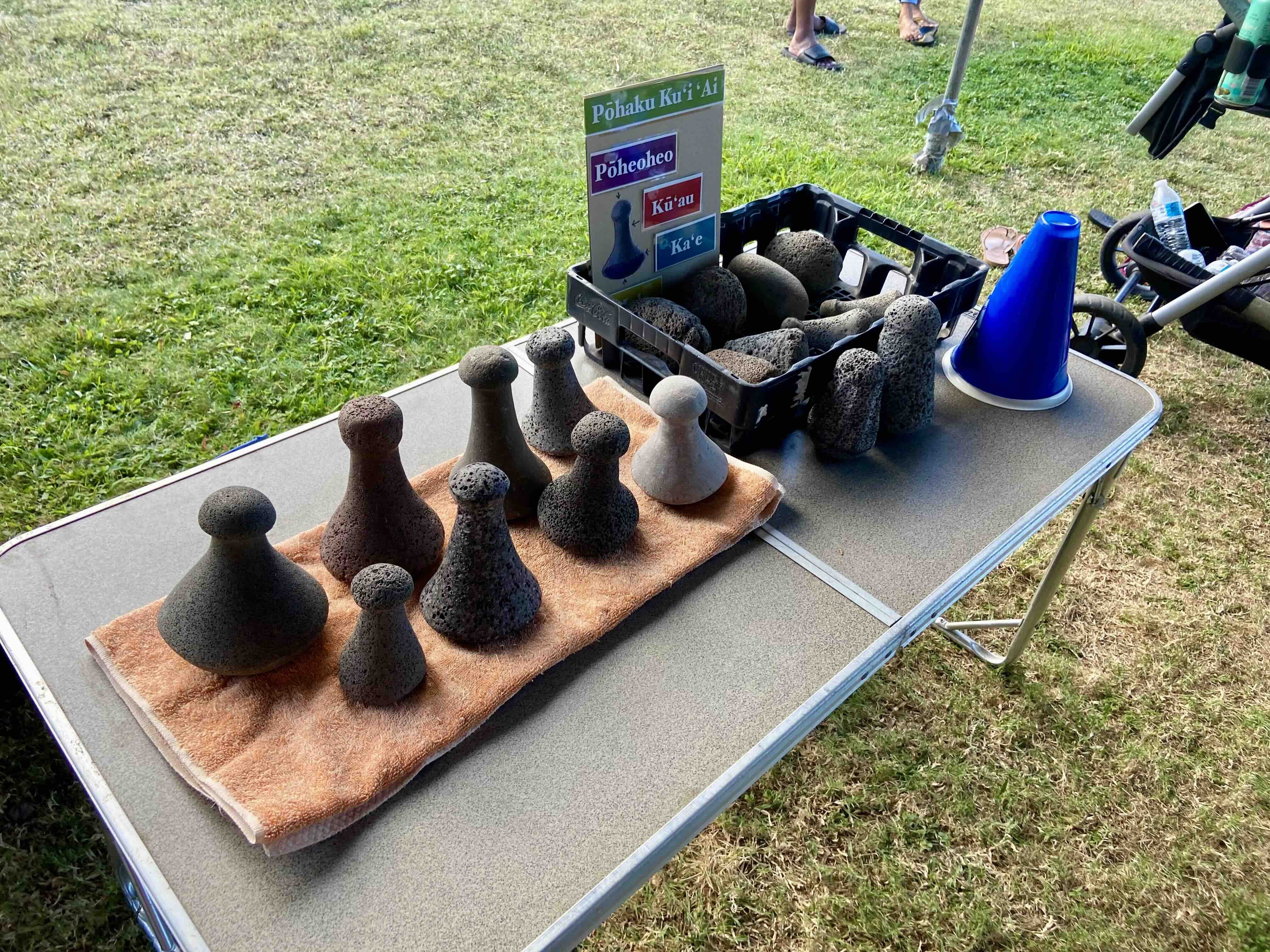 Stone poi pounders (pōhaku) come in all shapes and sizes, as displayed at a Board and Stone class in Waimānalo. Photo by Kelsey Kukaua Medeiros