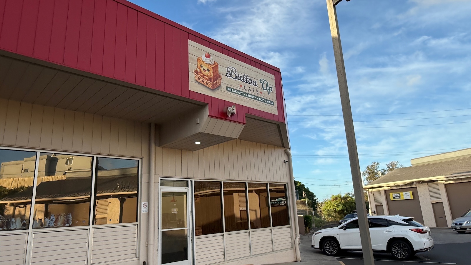 Button Up Cafe sign