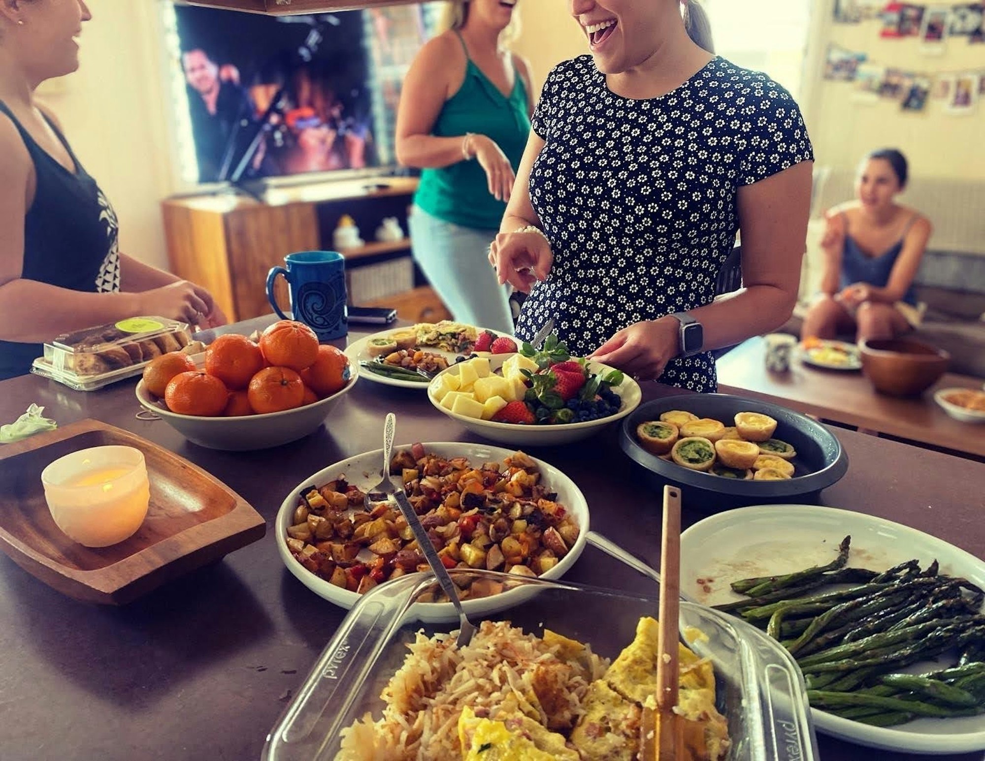 Food spread on a table a someone hosting in their home.