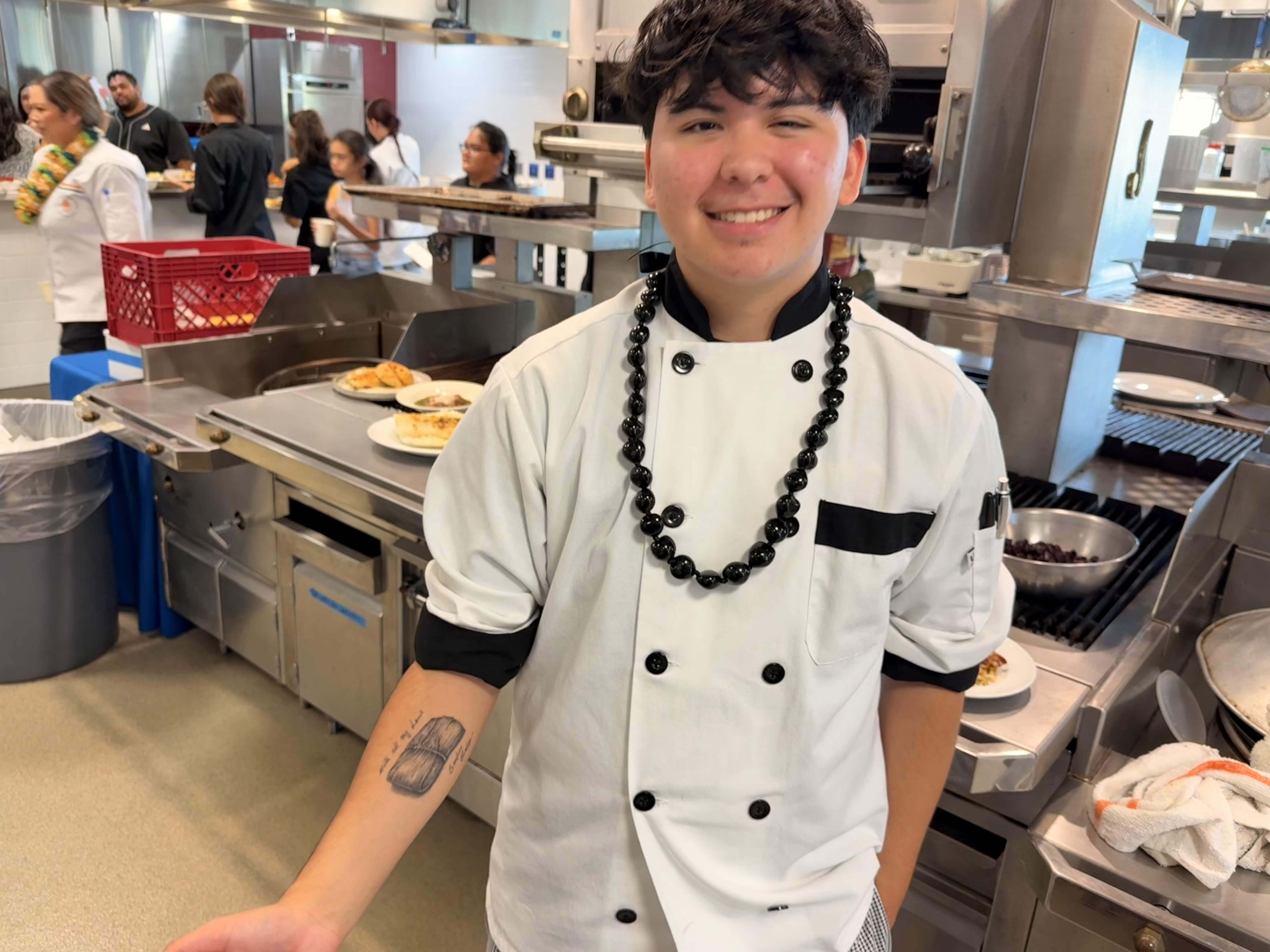 Kris Corrales show off his tamale tattoo that reads, "with all my love." It was an early high school graduation present, he said. Corrales plans to major in baking and pastry at Johnson & Whales University in Rhode Island come fall. Photos by Kelsey Kukaua Medeiros