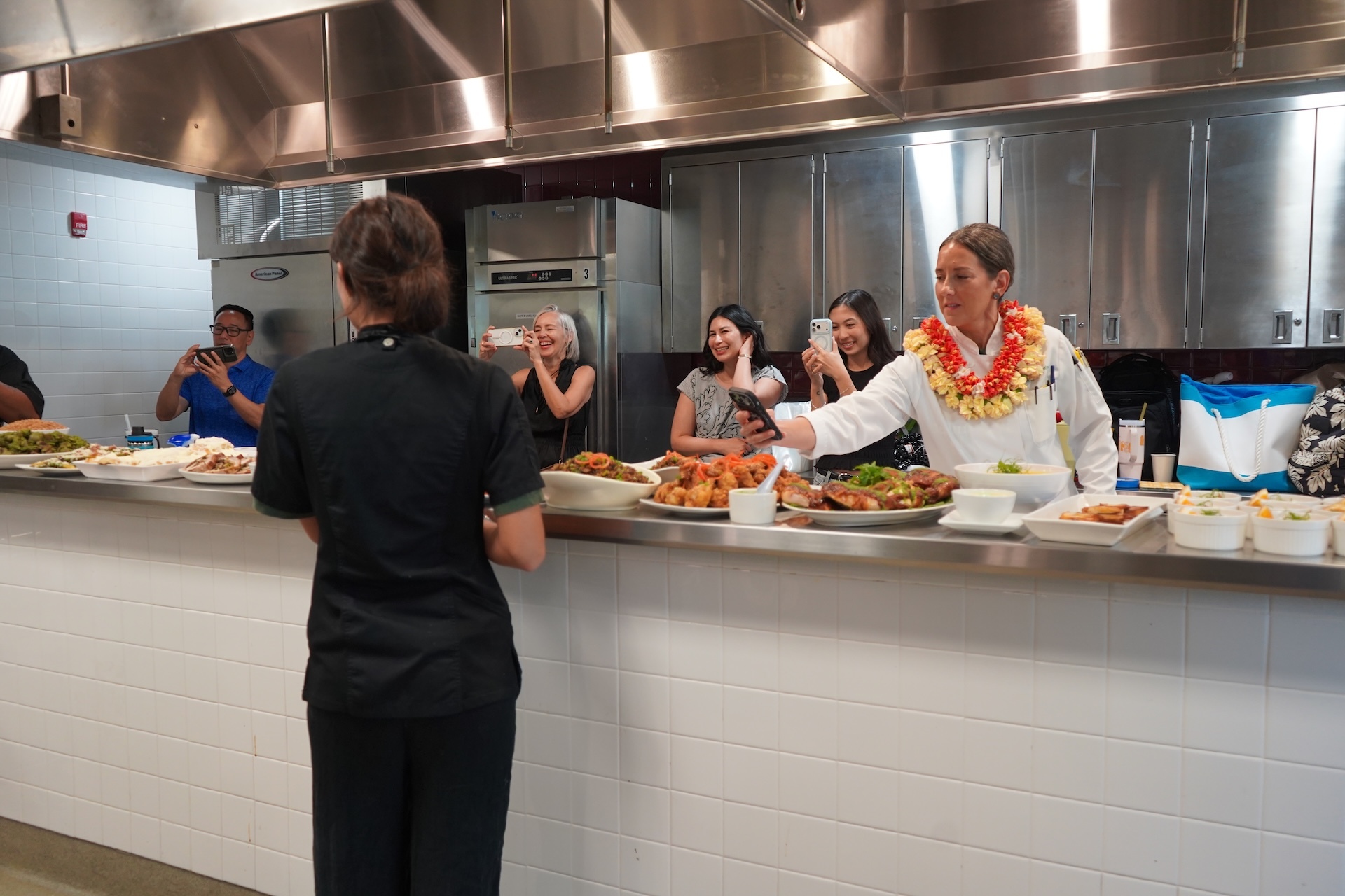 Jaeda Solywoda, who is going into her senior year at Kealakehe High School in Kailua-Kona, shared her group's dish, which included hand-mixed berry ice cream with nut toppings. Photo by Kelsey Kukaua Medeiros