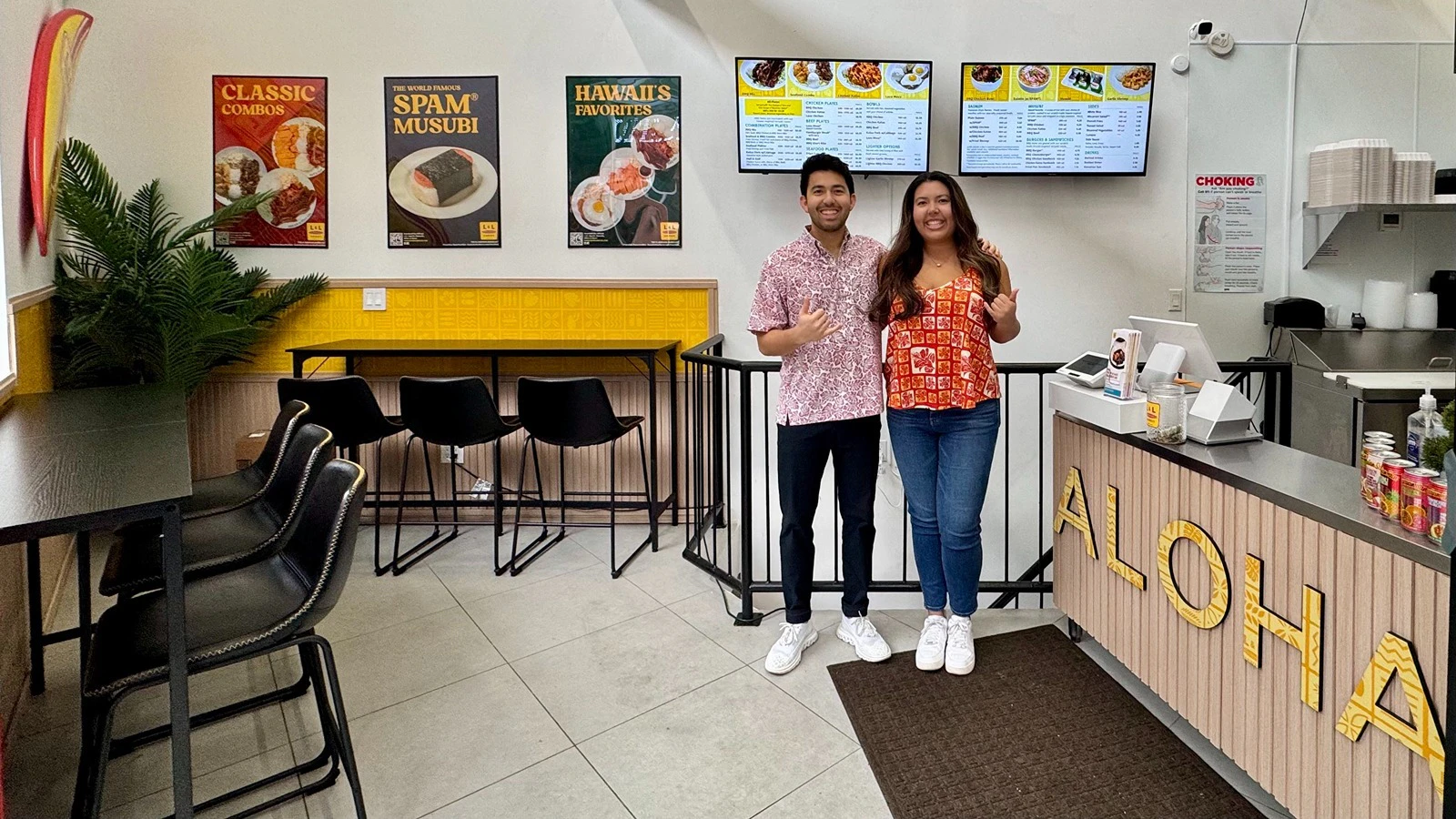L&L Hawaiian Barbecue franchisees Henry and Sephra Engel, a brother-sister team originally from O‘ahu. stand inside their recently opened location in Brooklyn.