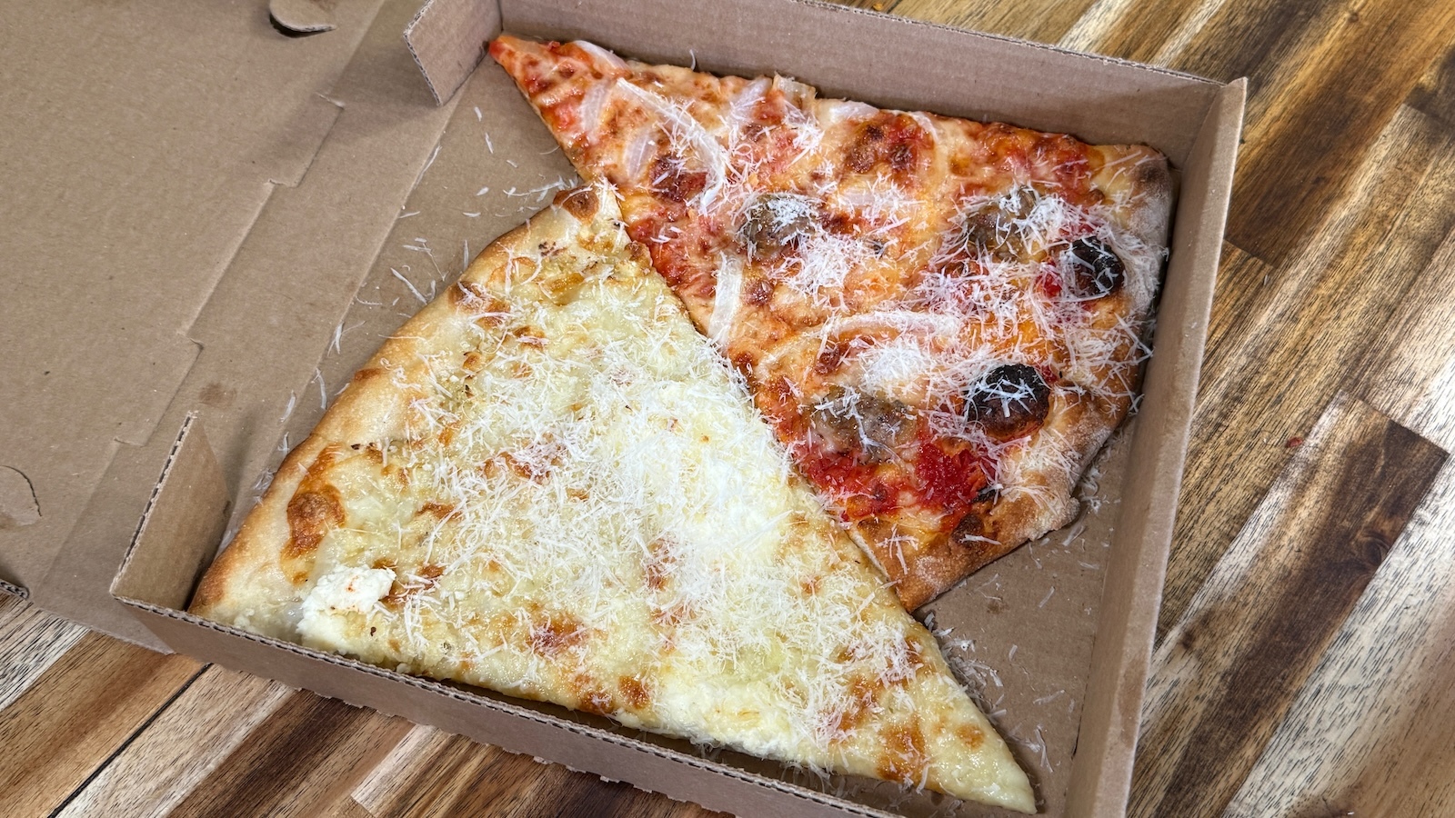 white pizza and sausage pizza