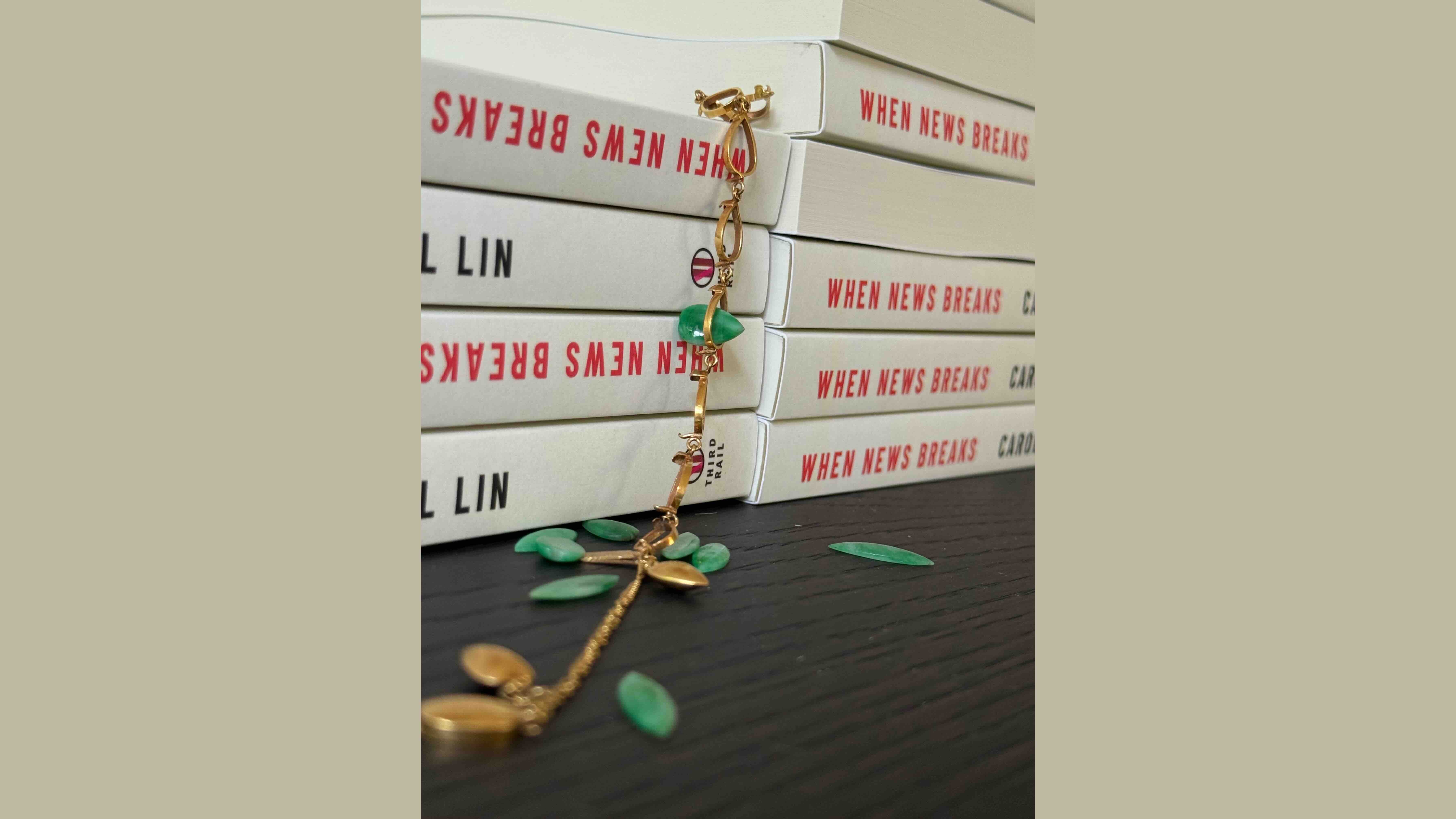The book’s cover features her mother's jade jewelry, symbolic of a woman’s sacrifice.