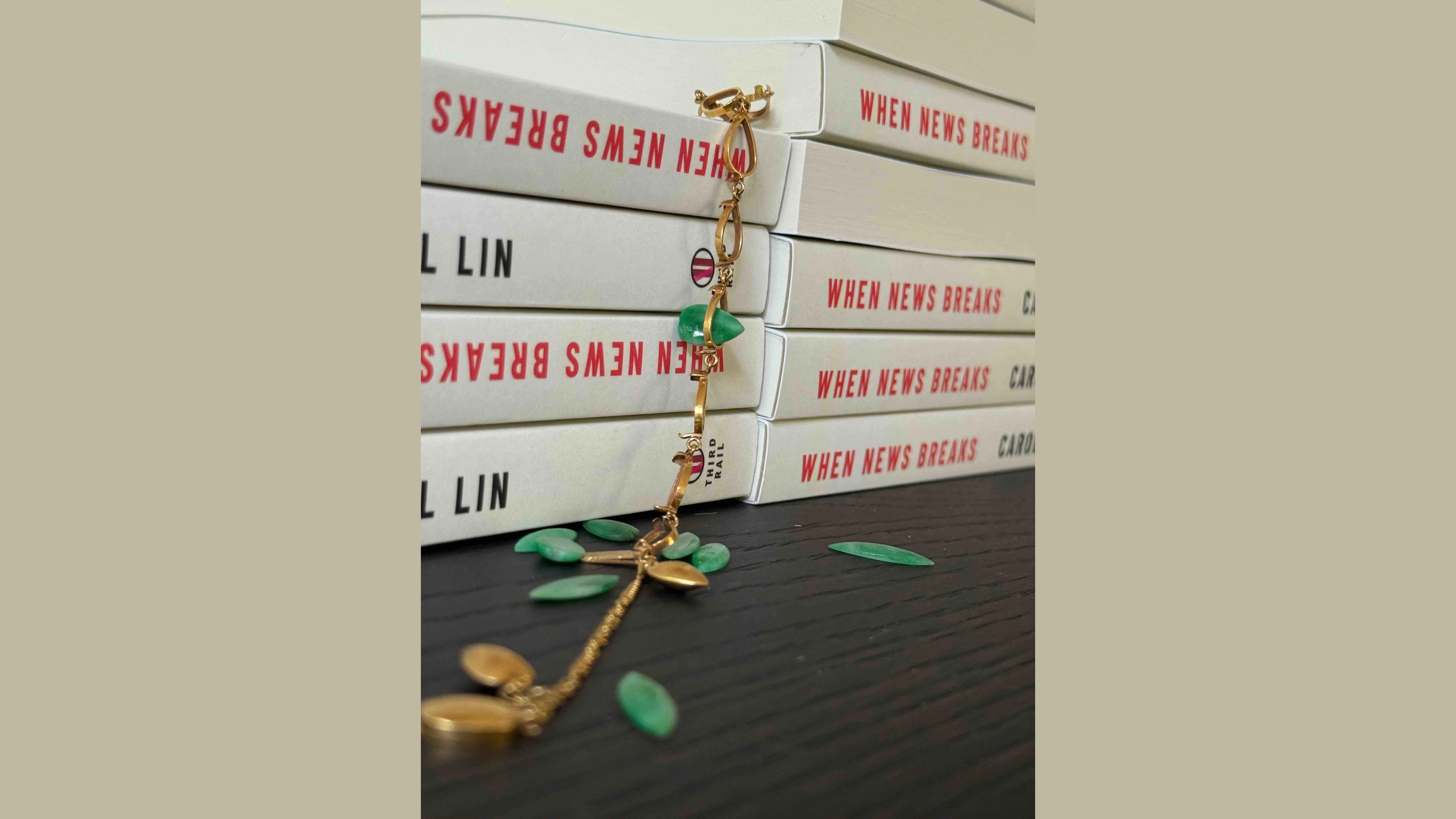 The book’s cover features her mother's jade jewelry, symbolic of a woman’s sacrifice.