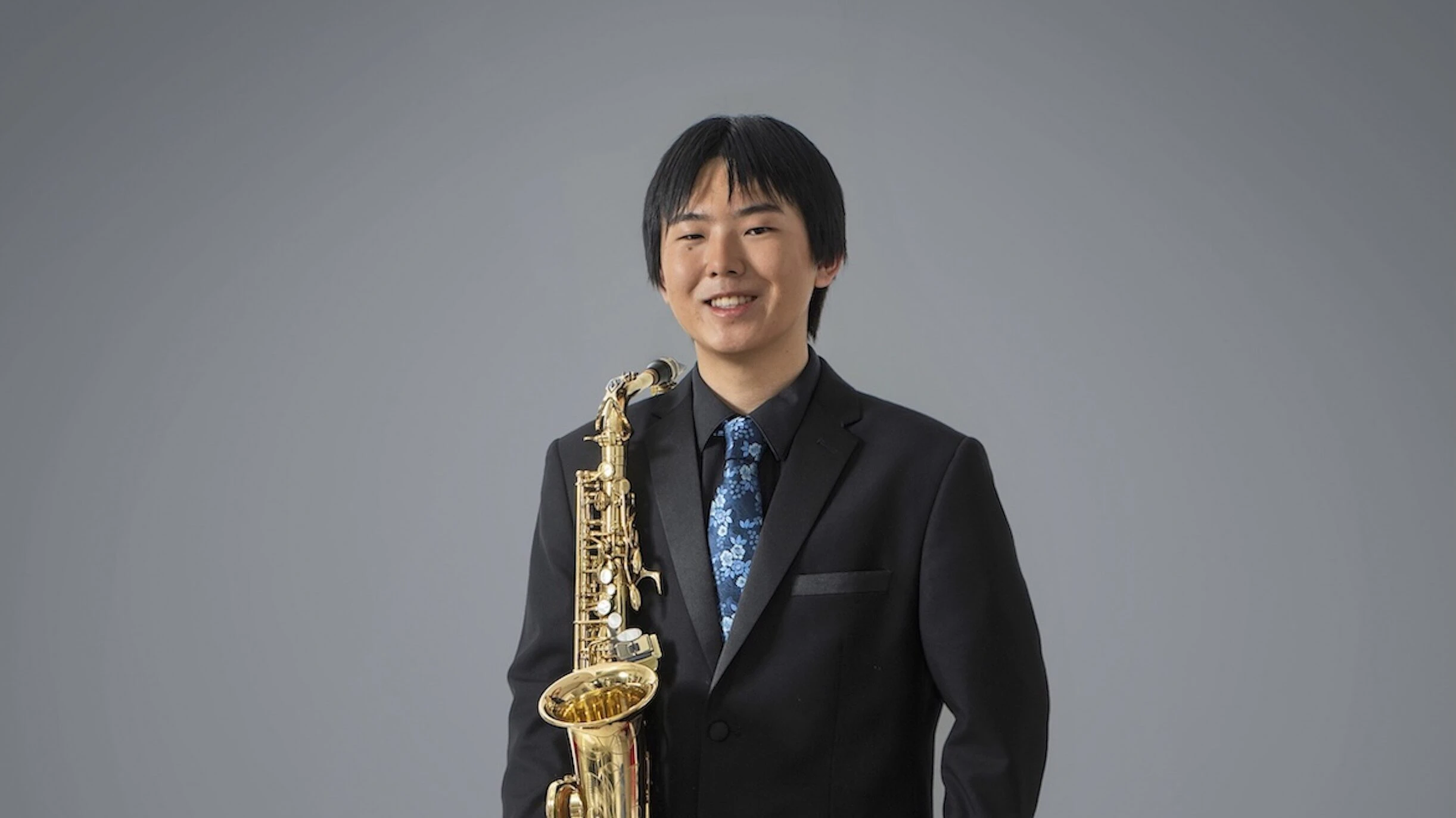 Cayne Hiraoka plays saxophone at the University of Hawaiʻi at Mānoa.