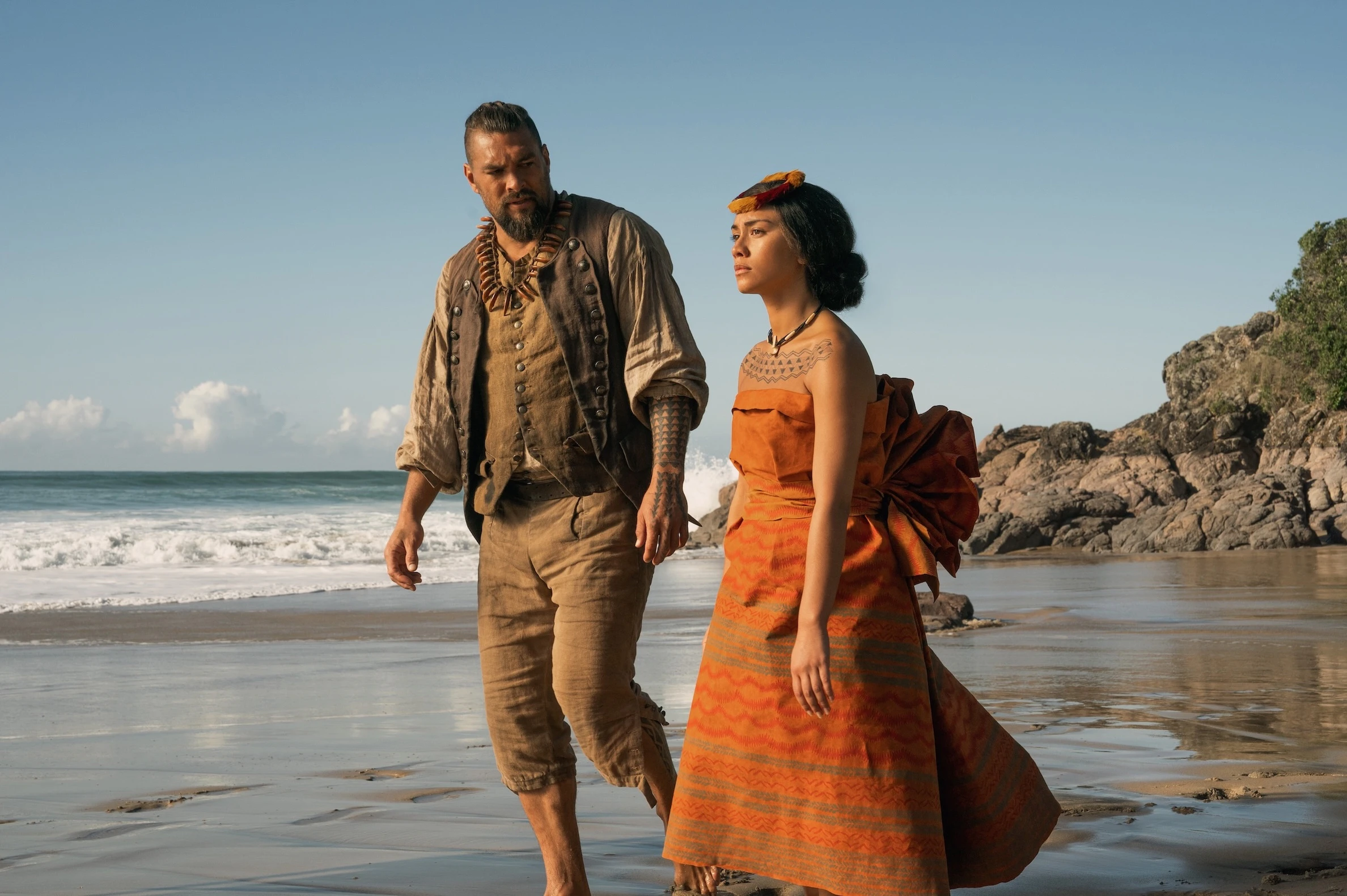 Jason Momoa, left, as Kaʻiana, and Luciane Buchanan, right, as Kaʻahumanu, one of the wives of Kamehameha, in episode seven of "Chief of War.”