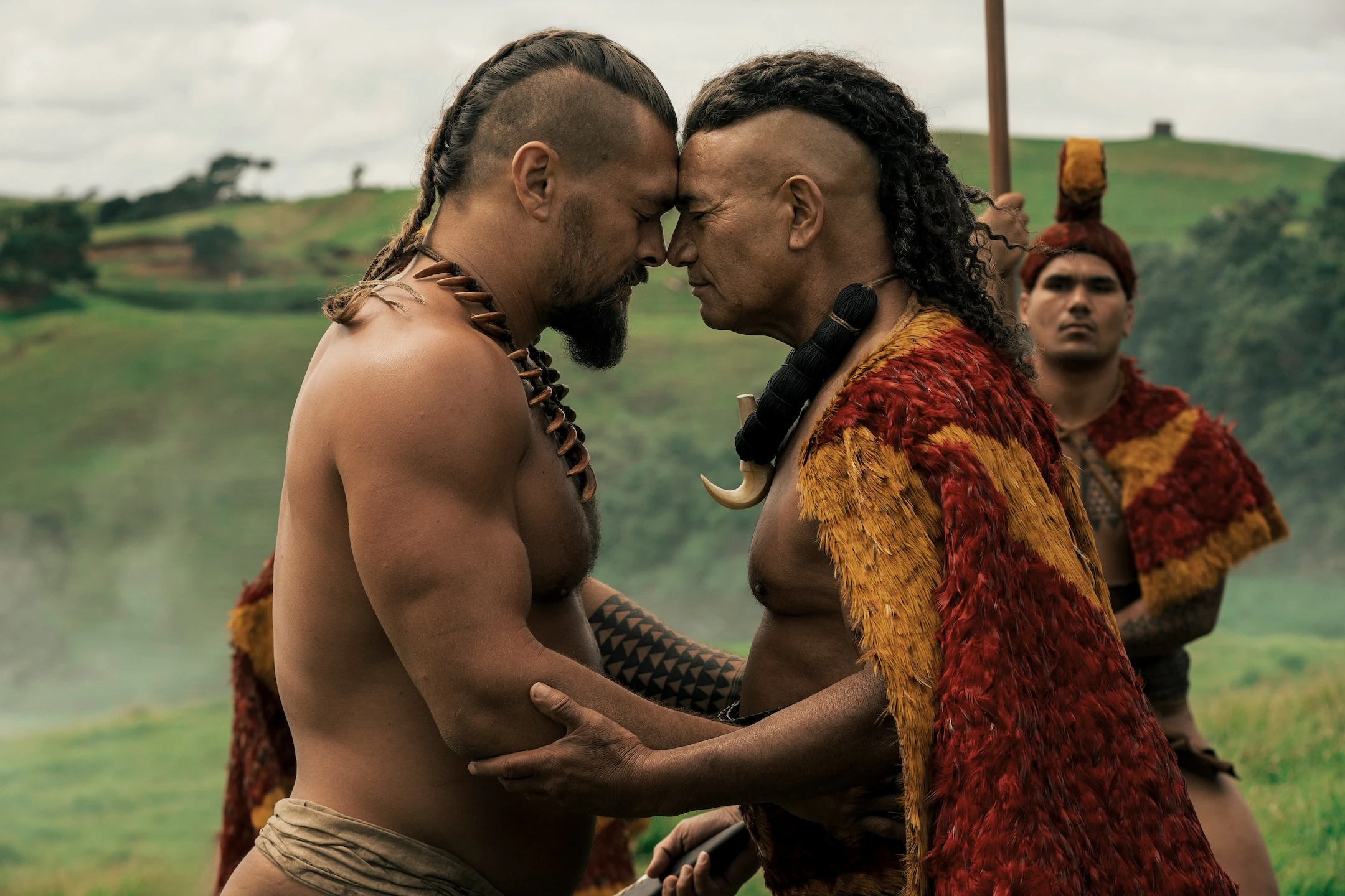 Jason Momoa, left, as Kaʻiana, and Temuera Morrison, right, as King Kahekili, in episode one of “Chief of War.”