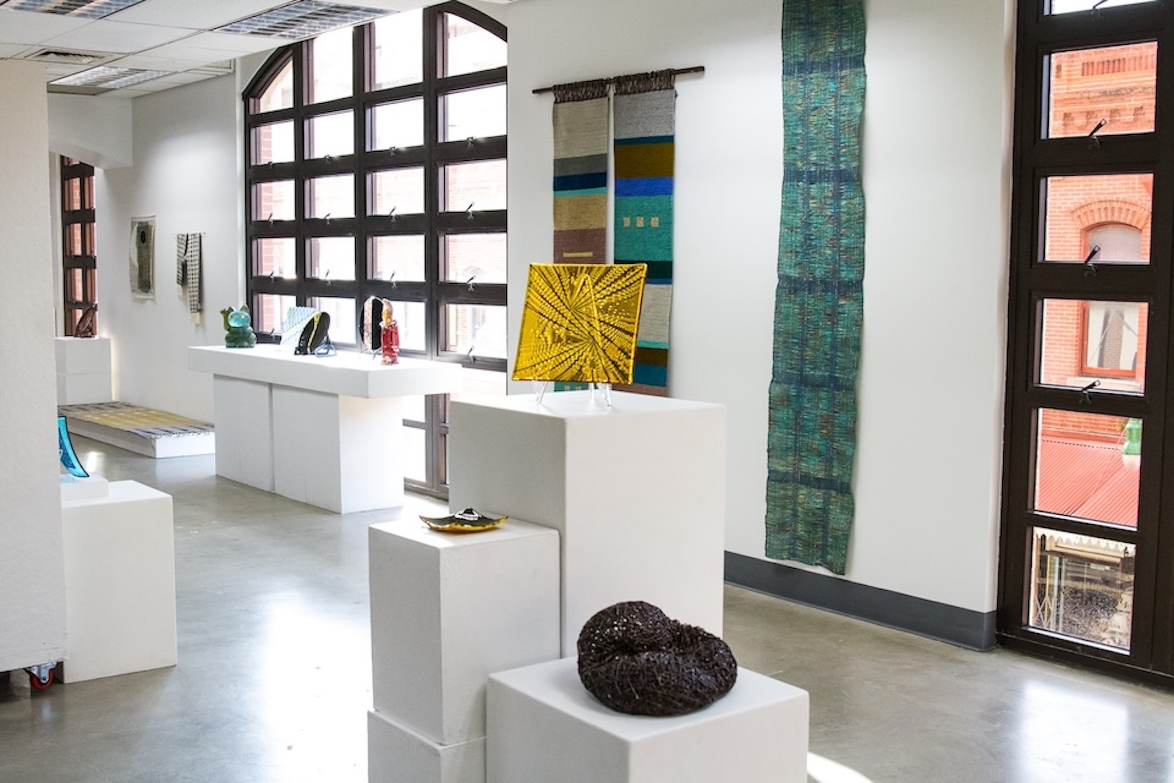 Downtown Art Center features art made from glass and fabric, among other materials. The Hawaiʻi Handweaver’s Hui and Hawaiʻi Arts Alliance have physical residence at DAC.