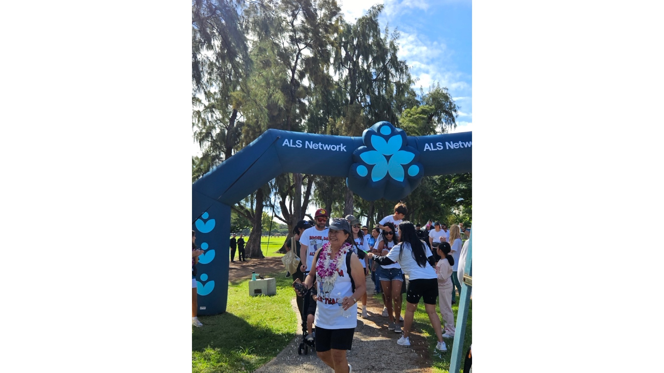 Fujio crosses the finish line at last year’s ALS walk at Kapi‘olani Park.