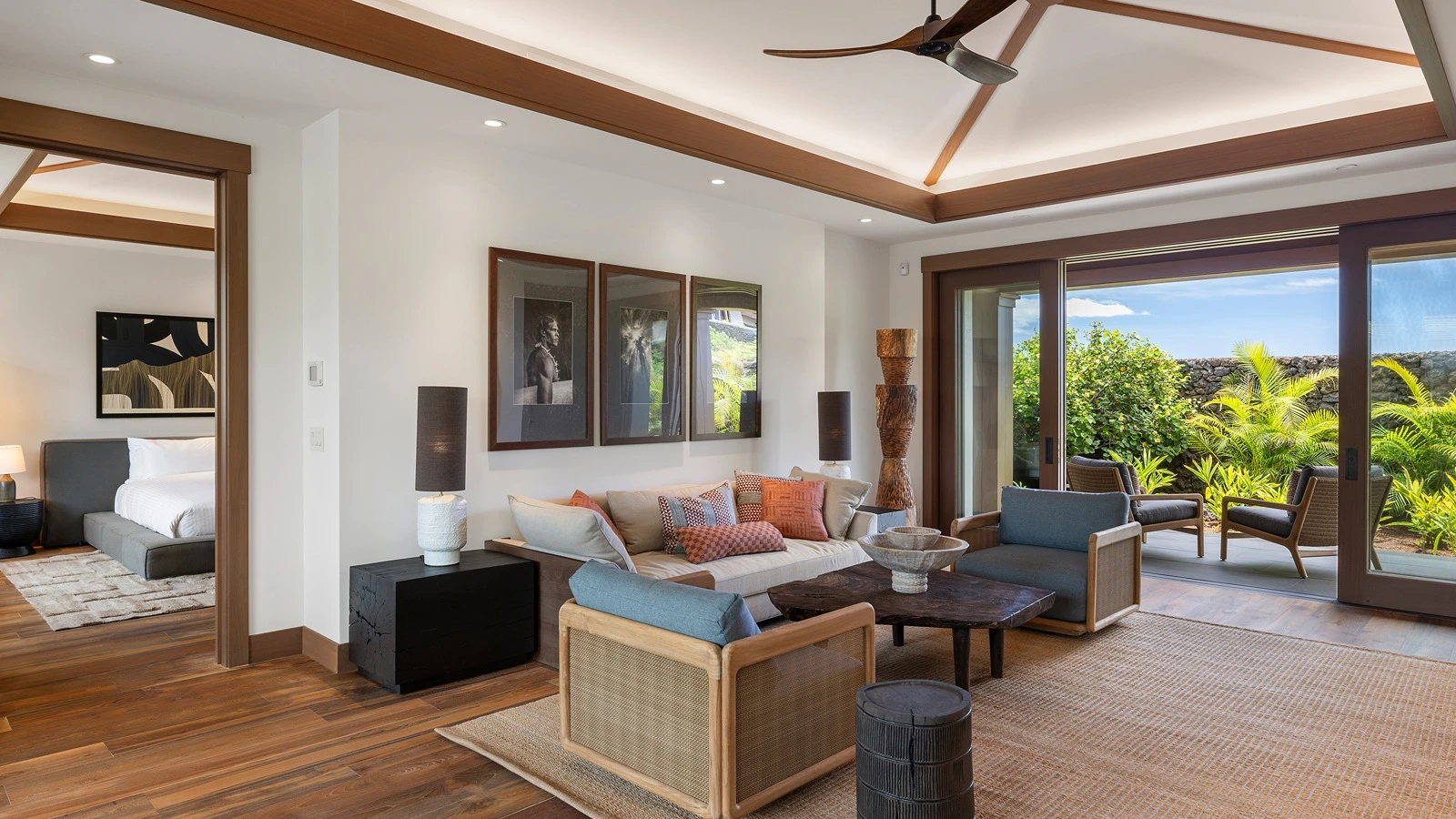 A seating area and bedroom in Hale Kai Mana.