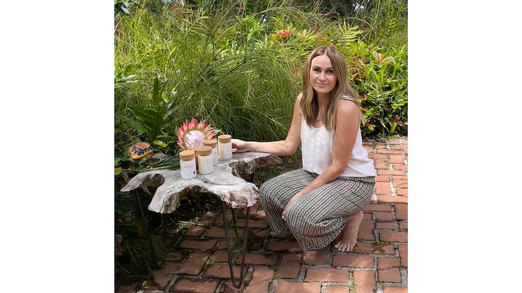 Shandra Hastings pictured outside with her candle products.