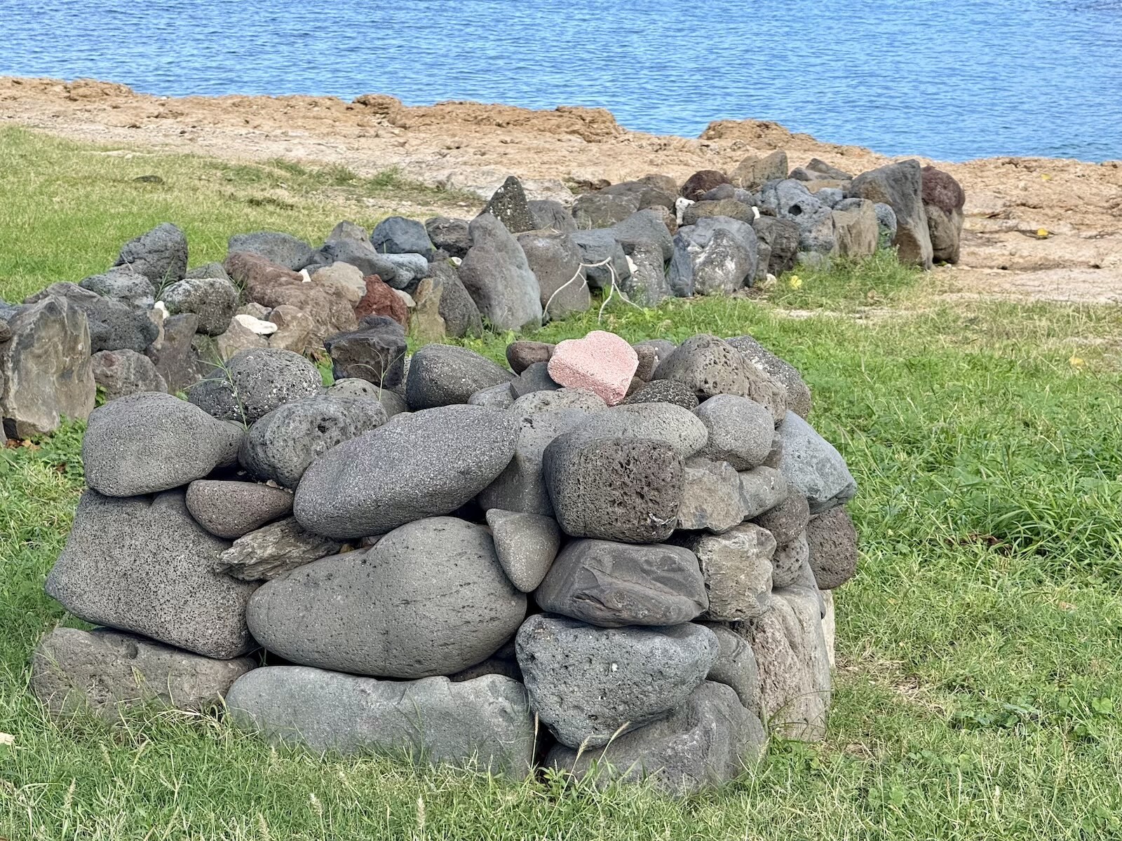 Though Kūʻīlioloa Heiau is not a burial site, the Order created a ceremonial place at the site to remember ancestors.