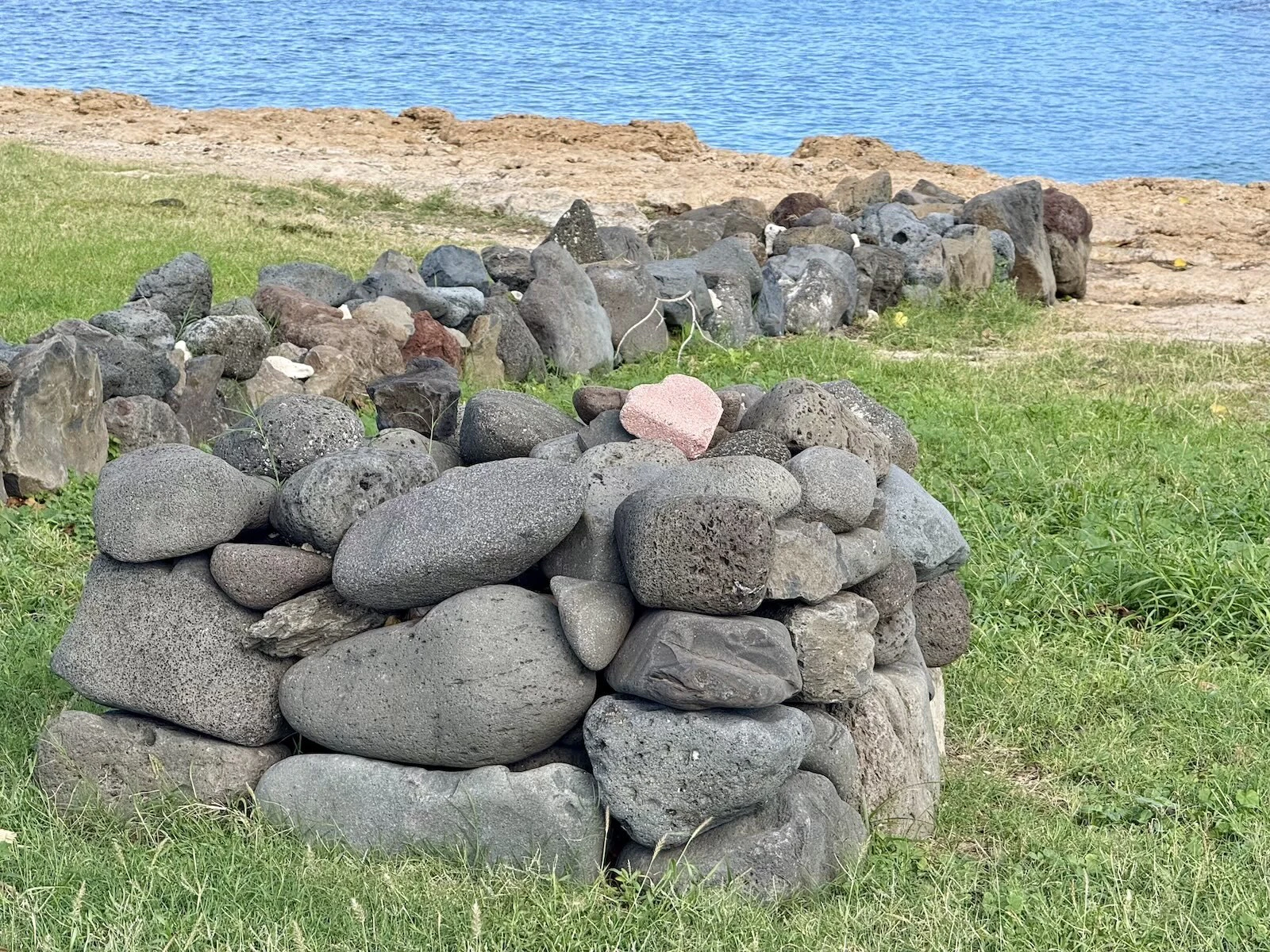Though Kūʻīlioloa Heiau is not a burial site, the Order created a ceremonial place at the site to remember ancestors.