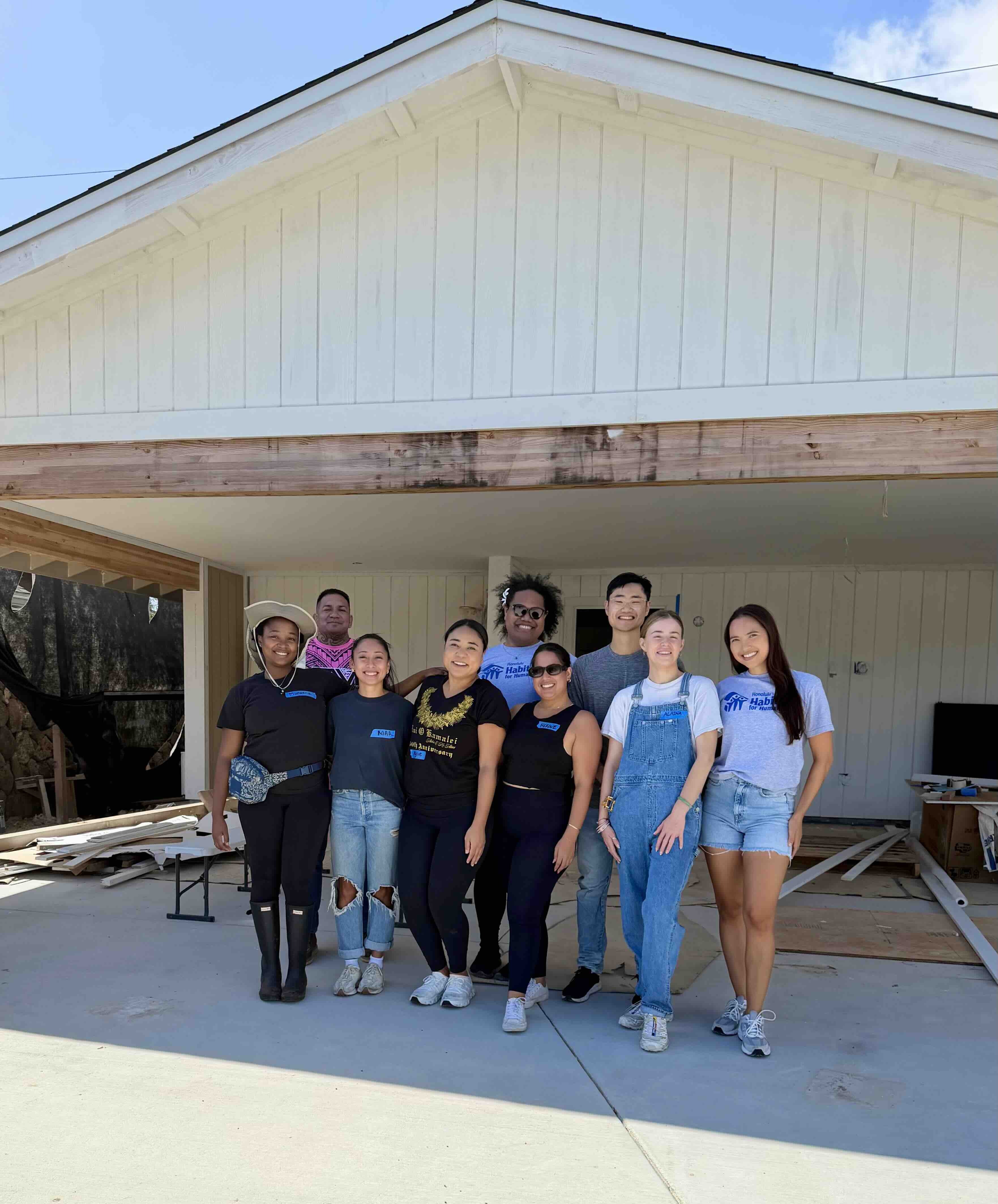 A group of Honolulu Habitat volunteers gathered on April 25 to paint and put the finishing touches on a home off Kakaʻina Street.