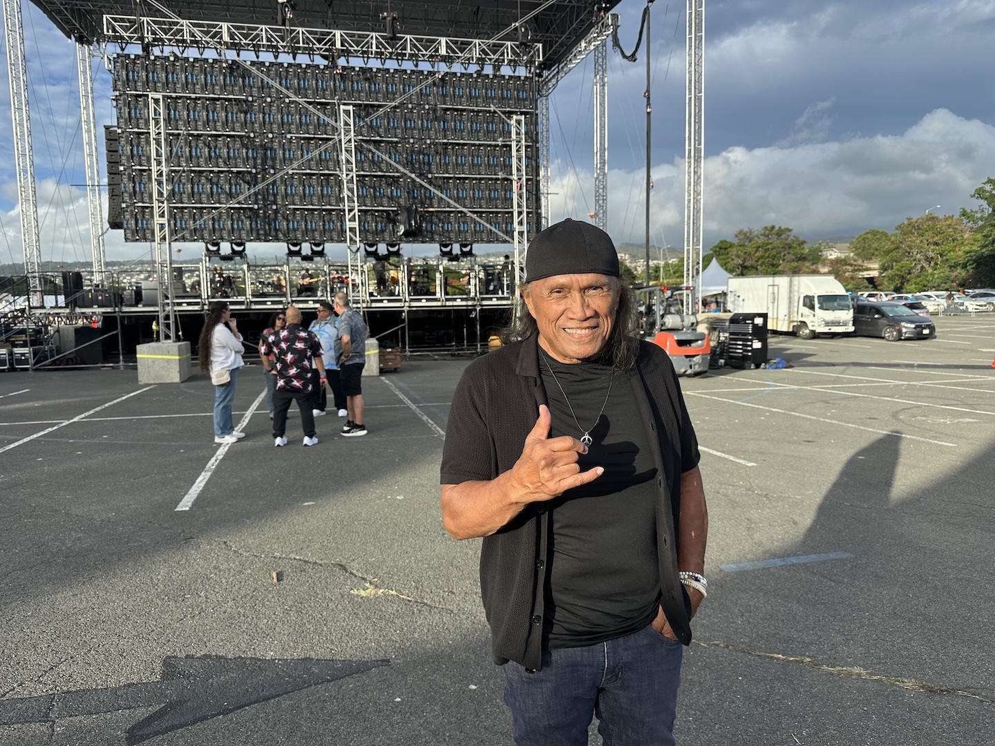 Henry Kapono performed with friends as part of the Aloha to Aloha Stadium concert. About 50 years earlier, he opened the stadium, performing as half of Cecilio & Kapono who were featured alongside Kalapana.