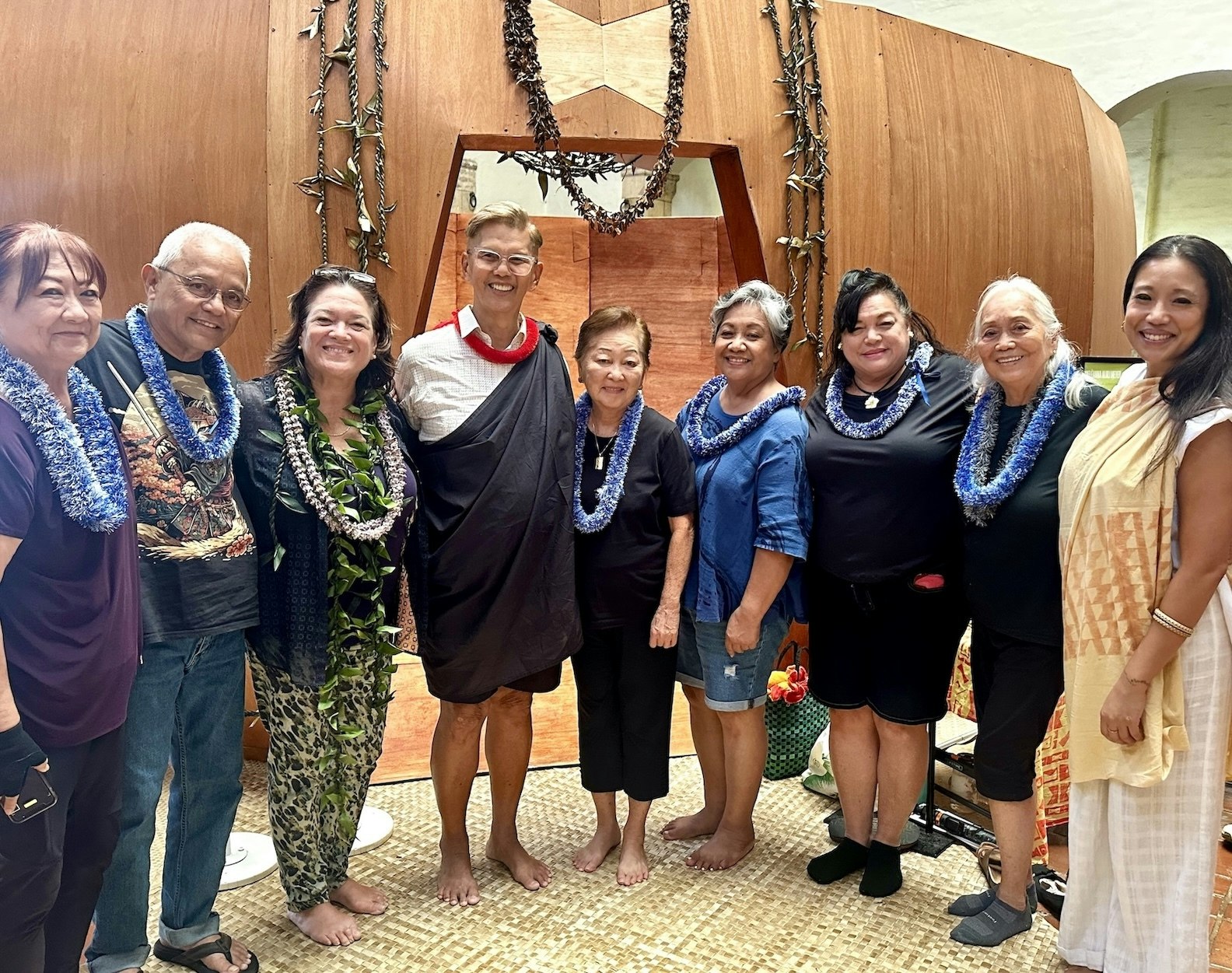 Some members of kumu hula Brad Lum’s hālau, gathered with Meleanna Aluli Meyer, third from left, in front of the ʻumeke on Wednesday, Feb. 26.