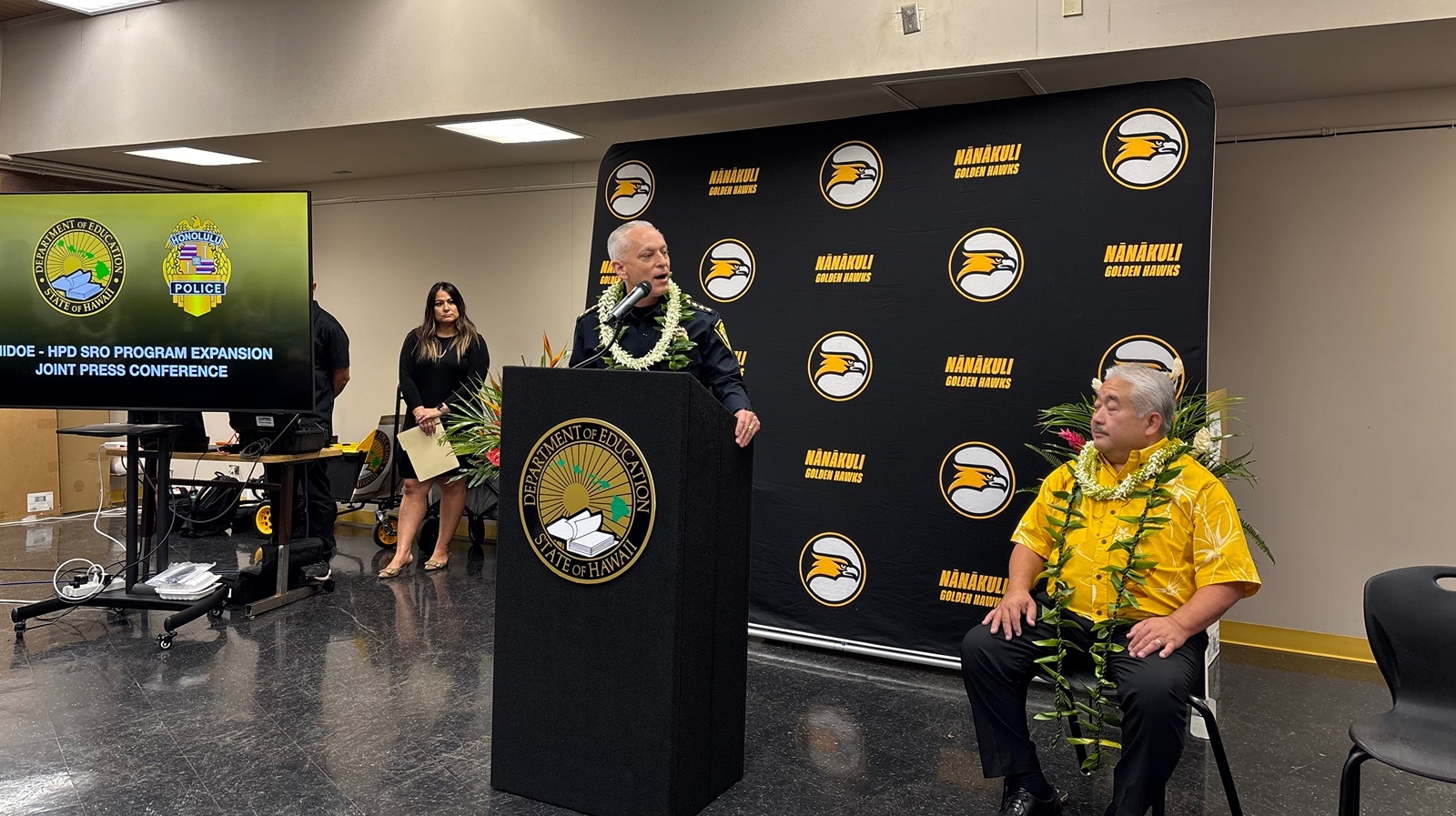 Honolulu Police Department Chief David Lazar thanks Hawaiʻi Department of Education Superintendent Keith Hiyashi at a press conference announcing the expansion of the School Resource Officer pilot to Nānākuli High and Intermediate School on Friday, July 31, 2026.