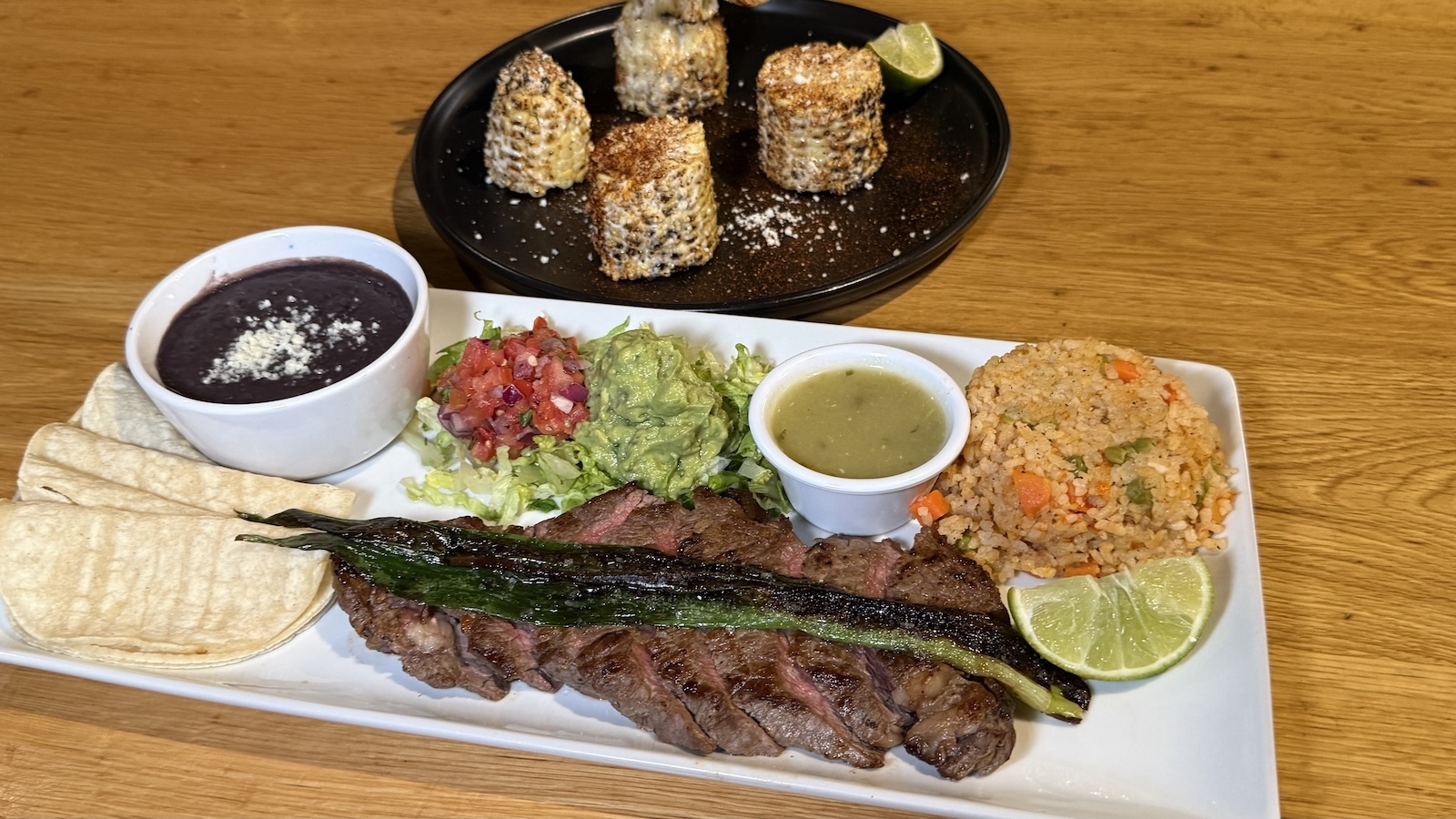 New York steak and elotes