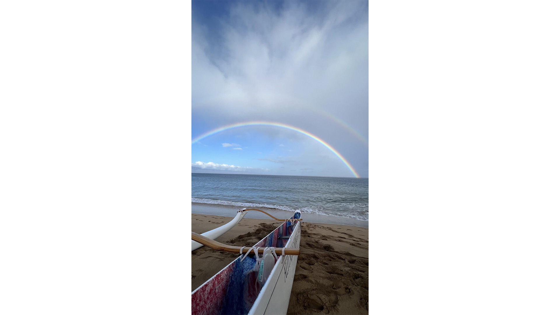 Double rainbow from the shore