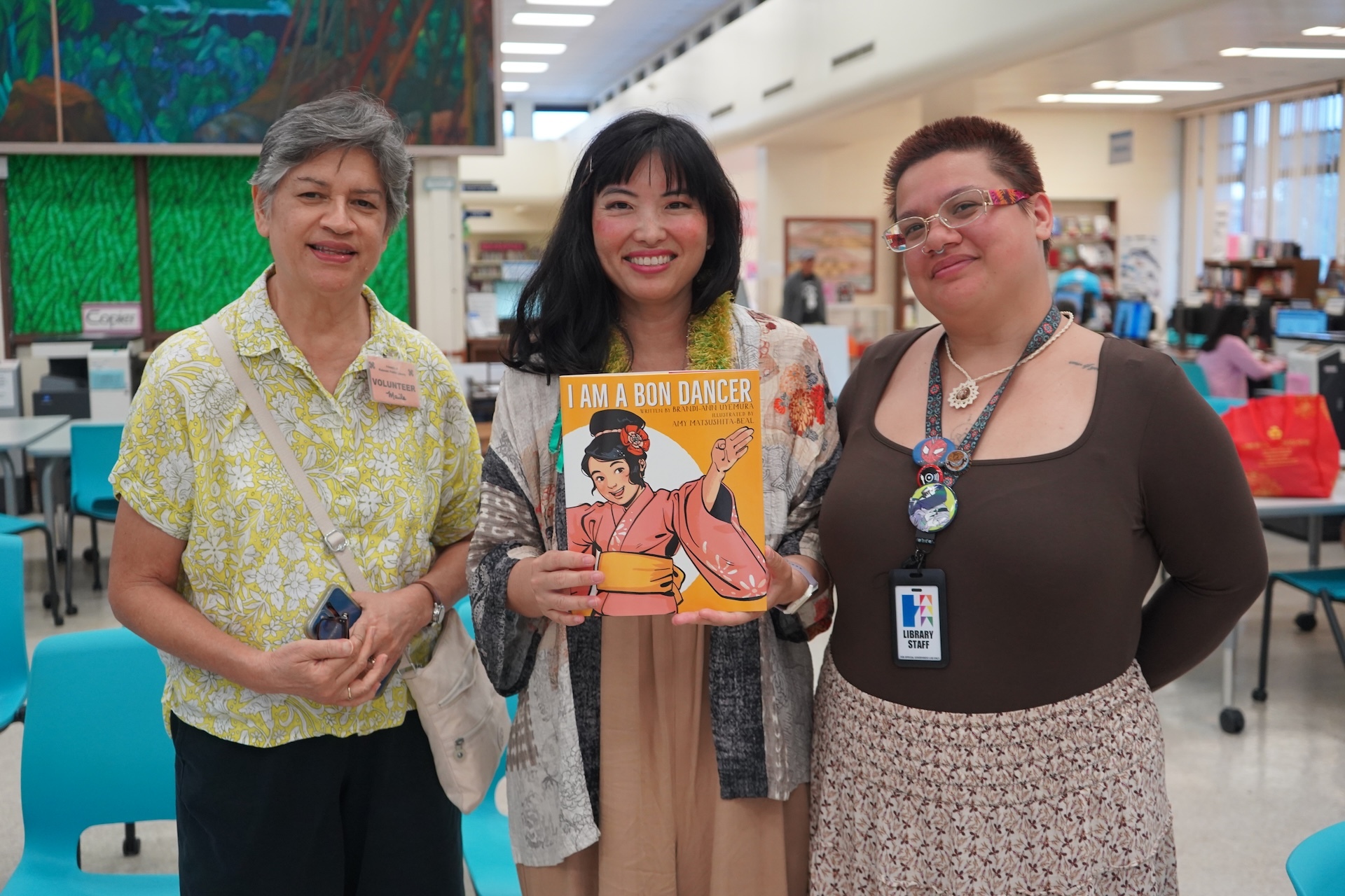 Kailua-based debut author Brandi-Ann Uyemura (center) was at the library prior to the scheduled Bon dance, promoting her newly released children’s book “I Am a Bon Dancer," with help from The Friends of Kaimukī Public Library. Photo by Kelsey Kukaua Medeiros