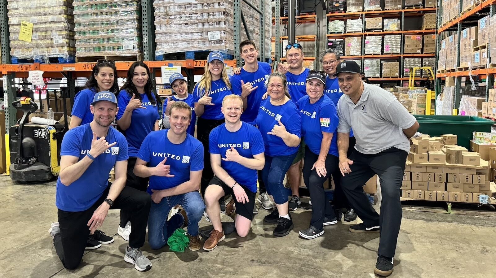 Group of volunteers in a food warehouse.