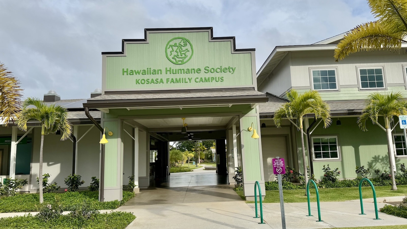 Exterior of a green animal shelter.