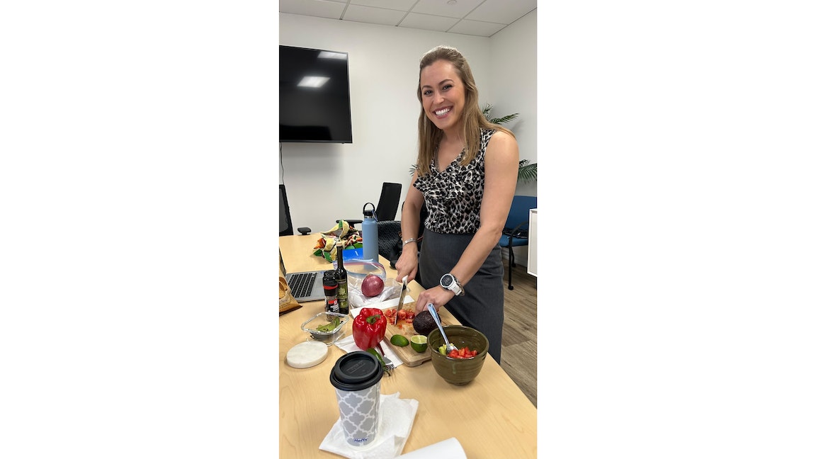 A woman preparing food.